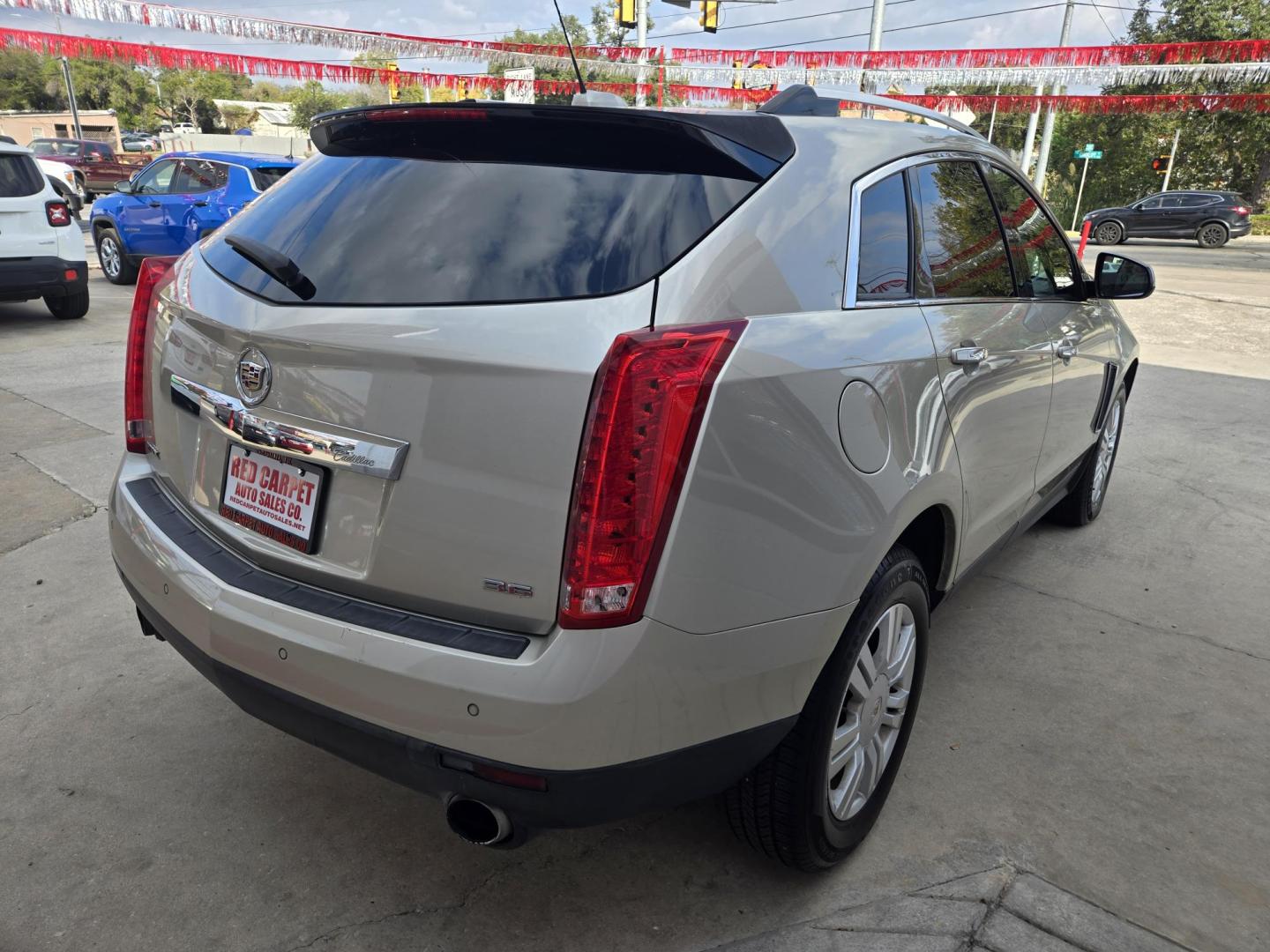 2015 GOLD Cadillac SRX Luxury Collection FWD (3GYFNBE37FS) with an 3.6L V6 DOHC 24V FFV engine, 6-Speed Automatic transmission, located at 503 West Court, Seguin, TX, 78155, (830) 379-3373, 29.568621, -97.969803 - Photo#2