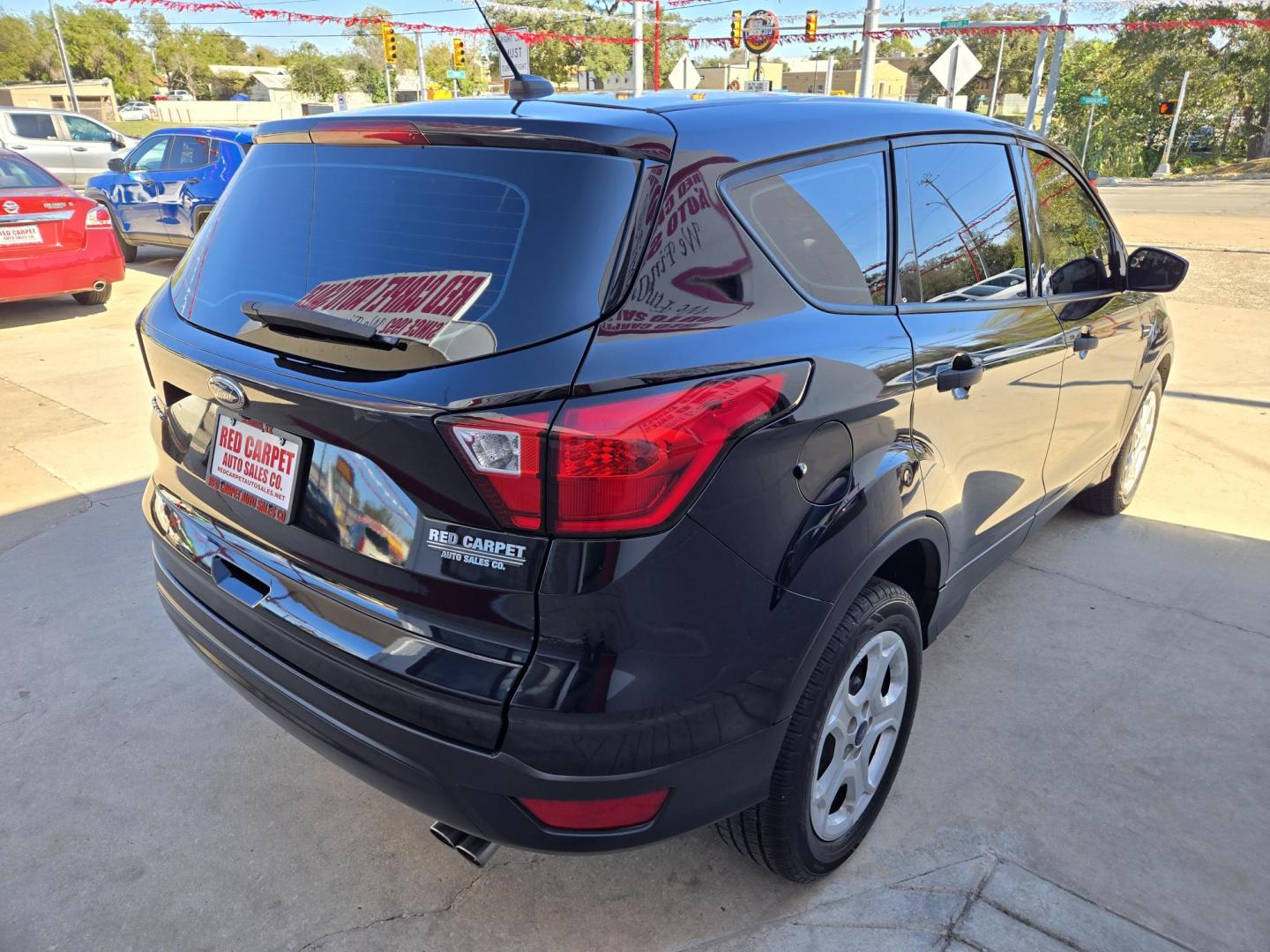 2019 Black Ford Escape S FWD (1FMCU0F76KU) with an 2.5L L4 DOHC 16V engine, 6A transmission, located at 503 West Court, Seguin, TX, 78155, (830) 379-3373, 29.568621, -97.969803 - 2019 Ford Escape S FWD with a 2.5L L4 DOHC 16V, Automatic, Tilt, Cruise, AM/FM Stereo, Power Windows, Locks and Side Mirrors, Bluetooth, Tinted Windows, Backup Camera, Automatic Headlights, Rear Wiper, Rear Defroster and more!! - Photo#2