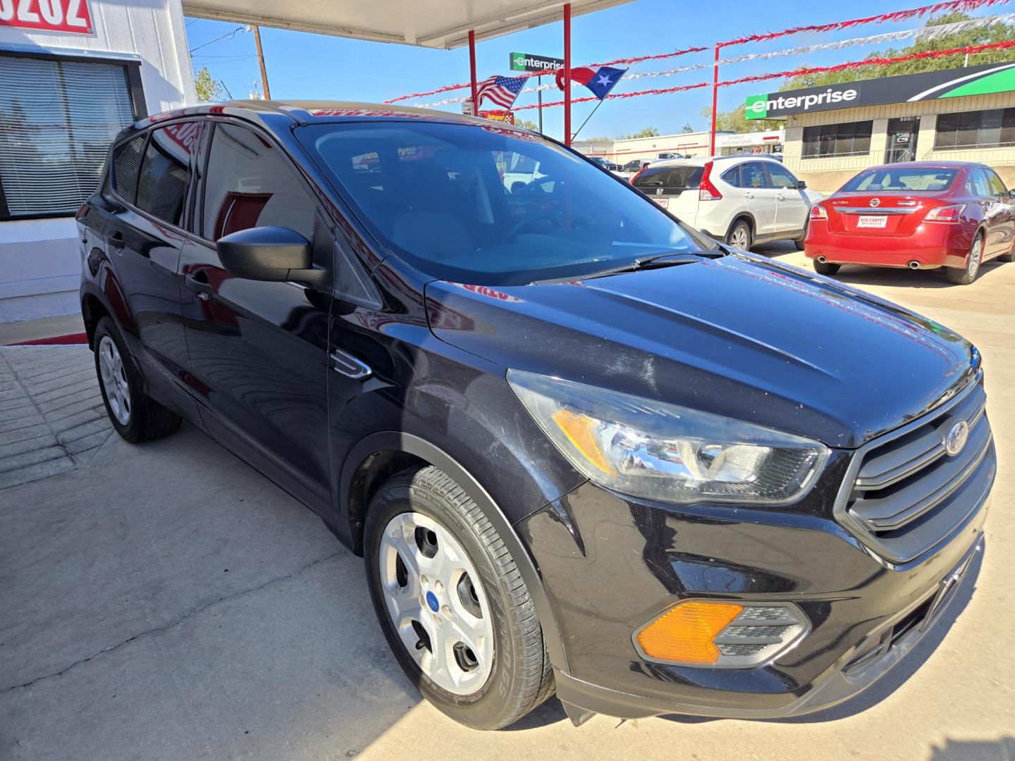 2019 Black Ford Escape S FWD (1FMCU0F76KU) with an 2.5L L4 DOHC 16V engine, 6A transmission, located at 503 West Court, Seguin, TX, 78155, (830) 379-3373, 29.568621, -97.969803 - 2019 Ford Escape S FWD with a 2.5L L4 DOHC 16V, Automatic, Tilt, Cruise, AM/FM Stereo, Power Windows, Locks and Side Mirrors, Bluetooth, Tinted Windows, Backup Camera, Automatic Headlights, Rear Wiper, Rear Defroster and more!! - Photo#1