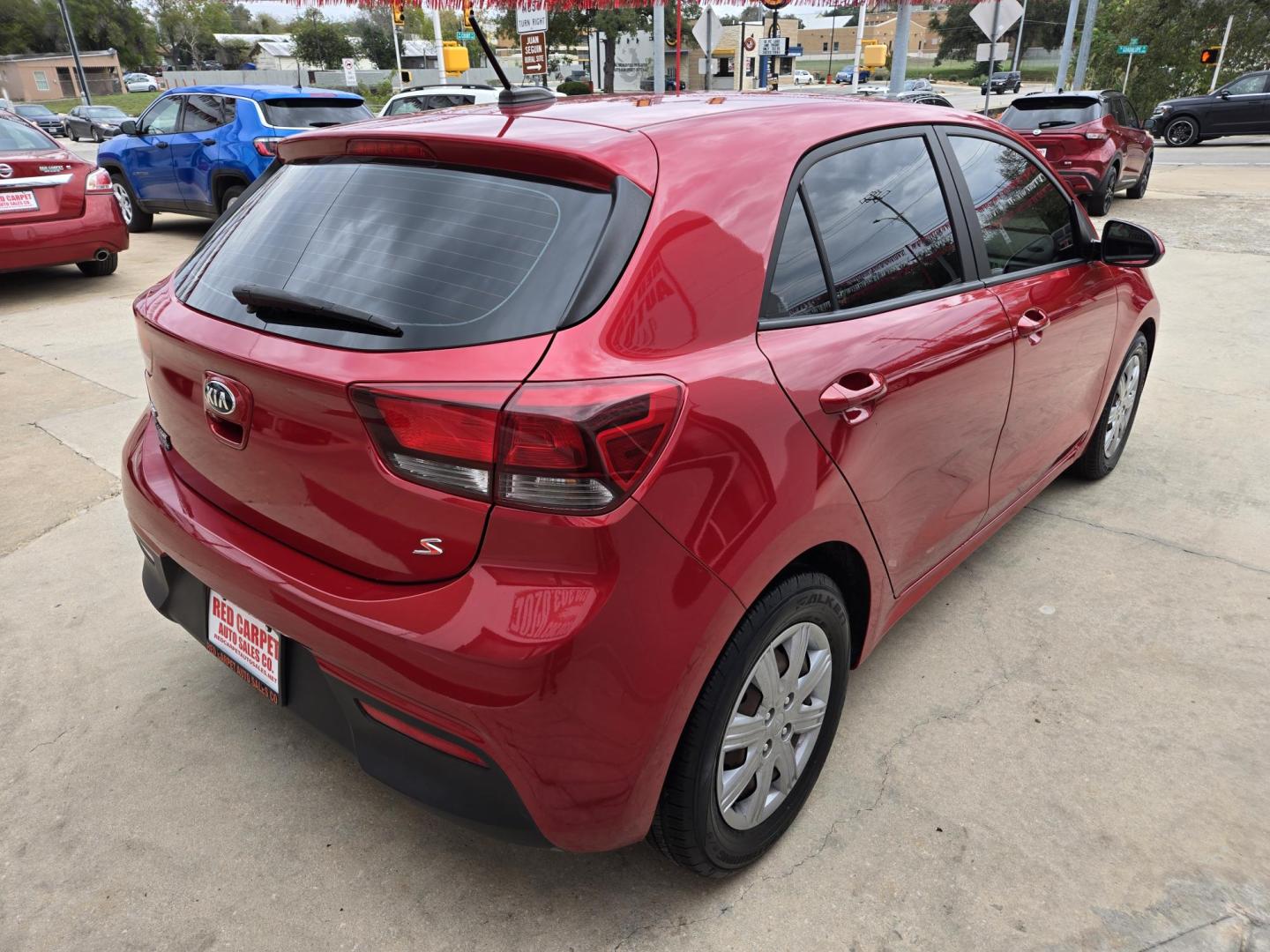 2021 Red Kia Rio5 S (3KPA25AD3ME) with an 1.6L L4 DOHC 16V engine, Automatic transmission, located at 503 West Court, Seguin, TX, 78155, (830) 379-3373, 29.568621, -97.969803 - 2021 Kia Rio5 S with a 1.6L L4 DOHC 16V, Automatic, Tilt, Cruise, AM/FM Touchscreen Stereo, Power Windows, Locks and Side Mirrors, Bluetooth, Tinted Windows, Automatic Headlights, Backup Camera, Rear Defroster and more!! - Photo#2