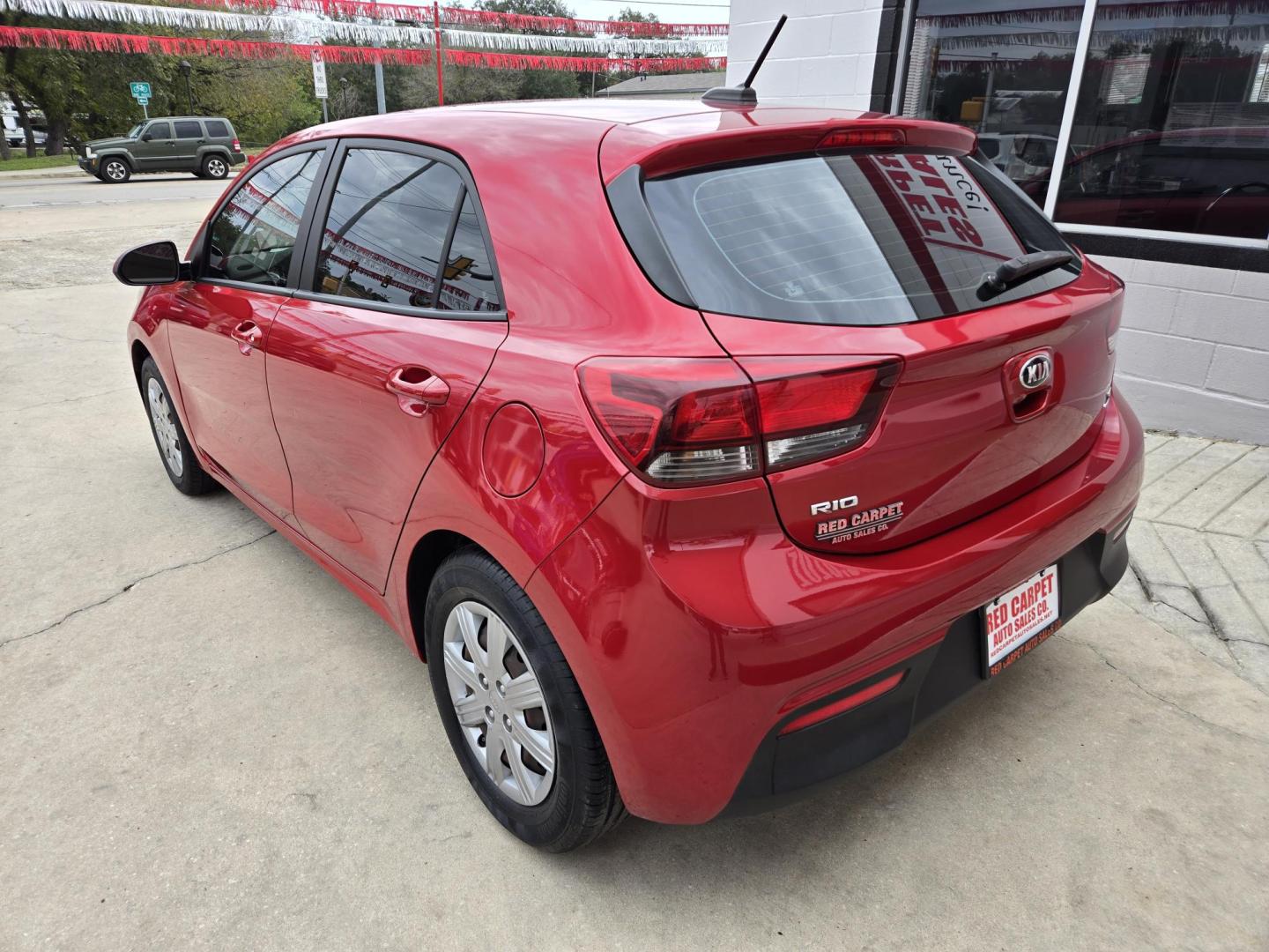 2021 Red Kia Rio5 S (3KPA25AD3ME) with an 1.6L L4 DOHC 16V engine, Automatic transmission, located at 503 West Court, Seguin, TX, 78155, (830) 379-3373, 29.568621, -97.969803 - 2021 Kia Rio5 S with a 1.6L L4 DOHC 16V, Automatic, Tilt, Cruise, AM/FM Touchscreen Stereo, Power Windows, Locks and Side Mirrors, Bluetooth, Tinted Windows, Automatic Headlights, Backup Camera, Rear Defroster and more!! - Photo#3