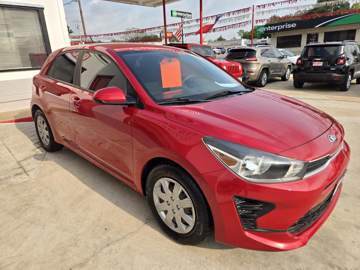 2021 Red Kia Rio5 S (3KPA25AD3ME) with an 1.6L L4 DOHC 16V engine, Automatic transmission, located at 503 West Court, Seguin, TX, 78155, (830) 379-3373, 29.568621, -97.969803- Photo#1