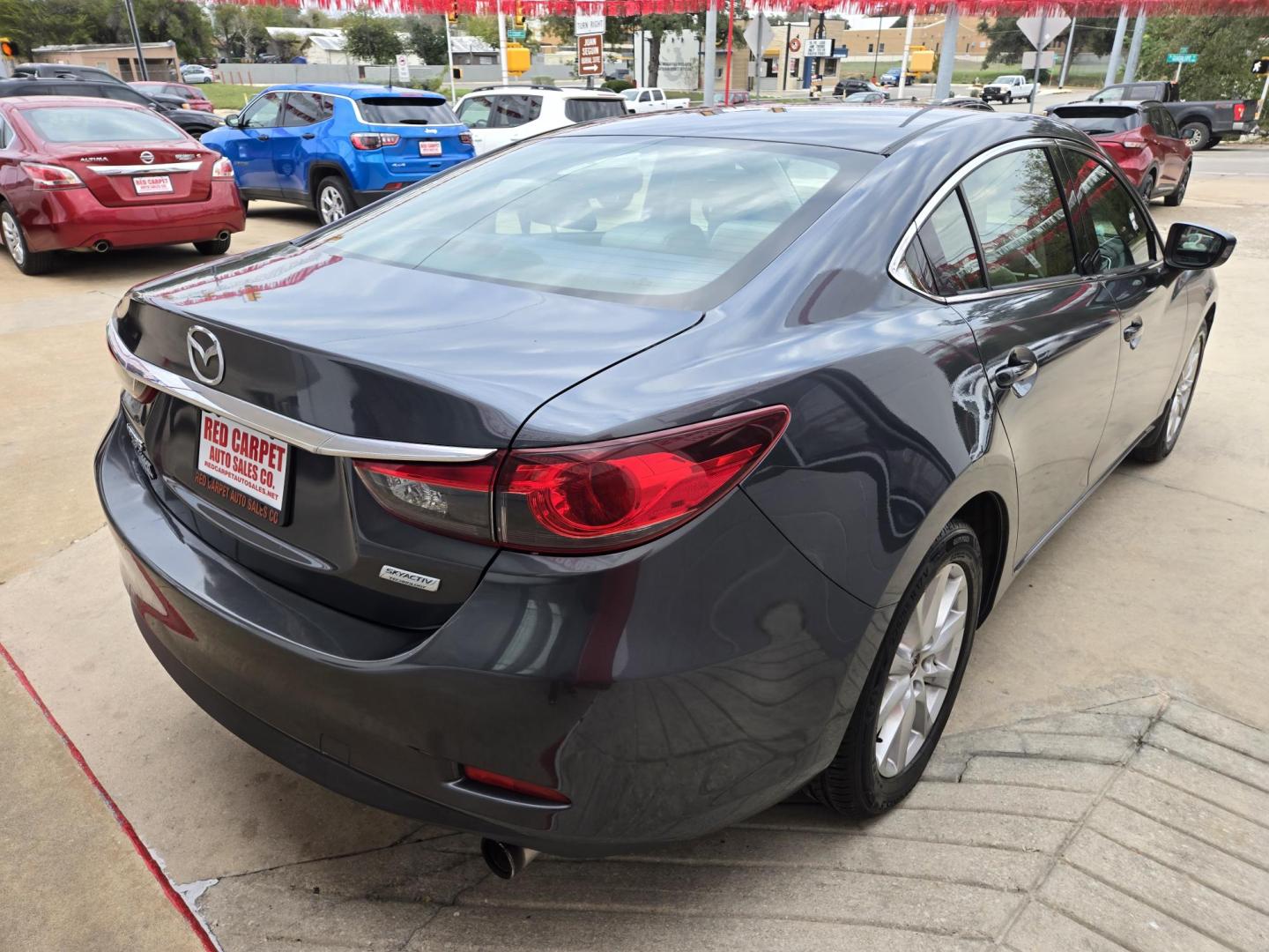 2014 GRAY Mazda Mazda6 i Sport AT (JM1GJ1U62E1) with an 2.5L L4 DOHC 16V engine, 6-Speed Automatic transmission, located at 503 West Court, Seguin, TX, 78155, (830) 379-3373, 29.568621, -97.969803 - Photo#2
