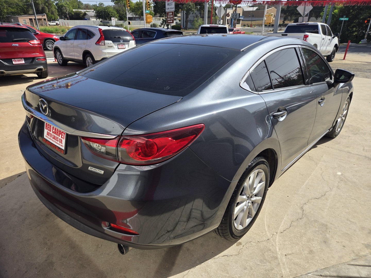 2014 GRAY Mazda Mazda6 i Sport AT (JM1GJ1U62E1) with an 2.5L L4 DOHC 16V engine, 6-Speed Automatic transmission, located at 503 West Court, Seguin, TX, 78155, (830) 379-3373, 29.568621, -97.969803 - 2014 Mazda Mazda6 i Sport AT with a 2.5L L4 DOHC 16V, Automatic, Tilt, Cruise, AM/FM/CD Touchscreen Stereo, Power Windows, Locks and Side Mirrors, Bluetooth, Backup Camera, Alloy Wheels, Rear Defroster and more!!- Photo#2