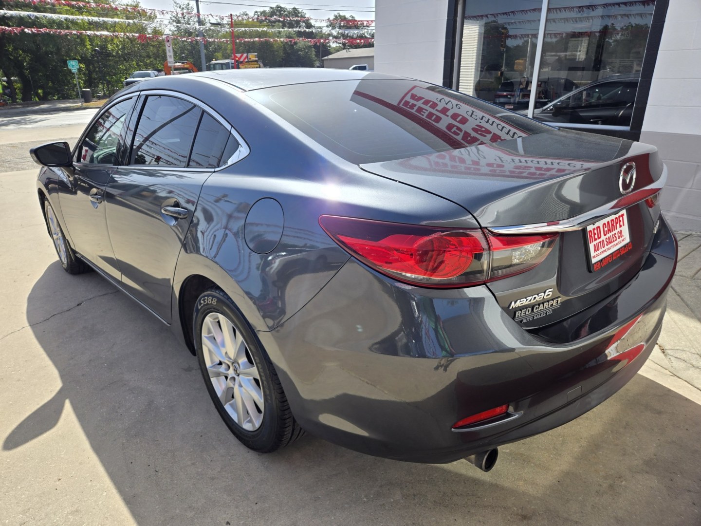 2014 GRAY Mazda Mazda6 i Sport AT (JM1GJ1U62E1) with an 2.5L L4 DOHC 16V engine, 6-Speed Automatic transmission, located at 503 West Court, Seguin, TX, 78155, (830) 379-3373, 29.568621, -97.969803 - 2014 Mazda Mazda6 i Sport AT with a 2.5L L4 DOHC 16V, Automatic, Tilt, Cruise, AM/FM/CD Touchscreen Stereo, Power Windows, Locks and Side Mirrors, Bluetooth, Backup Camera, Alloy Wheels, Rear Defroster and more!!- Photo#3