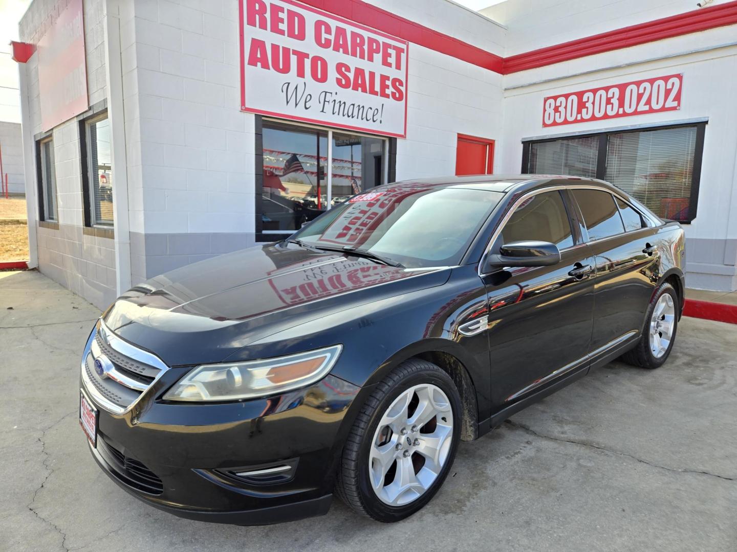 2011 Black Ford Taurus SEL FWD (1FAHP2EWXBG) with an 3.5L V6 DOHC 24V engine, 6-Speed Automatic transmission, located at 503 West Court, Seguin, TX, 78155, (830) 379-3373, 29.568621, -97.969803 - 2011 Ford Taurus SEL FWD with a 3.5L V6 DOHC 24V, Automatic, Tilt, Cruise, AM/FM/CD Stereo, Power Windows, Locks, Seat and Side Mirrors, Bluetooth, Leather Seating, Heated Seats, Tinted Windows, Dual Climate Control, Alloy Wheels, Rear Defroster and more!! - Photo#0