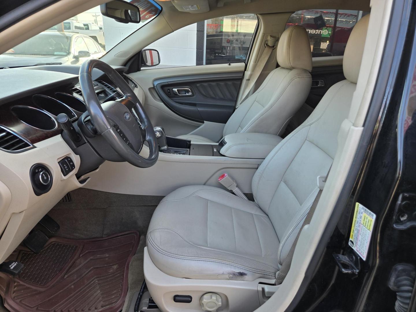 2011 Black Ford Taurus SEL FWD (1FAHP2EWXBG) with an 3.5L V6 DOHC 24V engine, 6-Speed Automatic transmission, located at 503 West Court, Seguin, TX, 78155, (830) 379-3373, 29.568621, -97.969803 - 2011 Ford Taurus SEL FWD with a 3.5L V6 DOHC 24V, Automatic, Tilt, Cruise, AM/FM/CD Stereo, Power Windows, Locks, Seat and Side Mirrors, Bluetooth, Leather Seating, Heated Seats, Tinted Windows, Dual Climate Control, Alloy Wheels, Rear Defroster and more!! - Photo#4