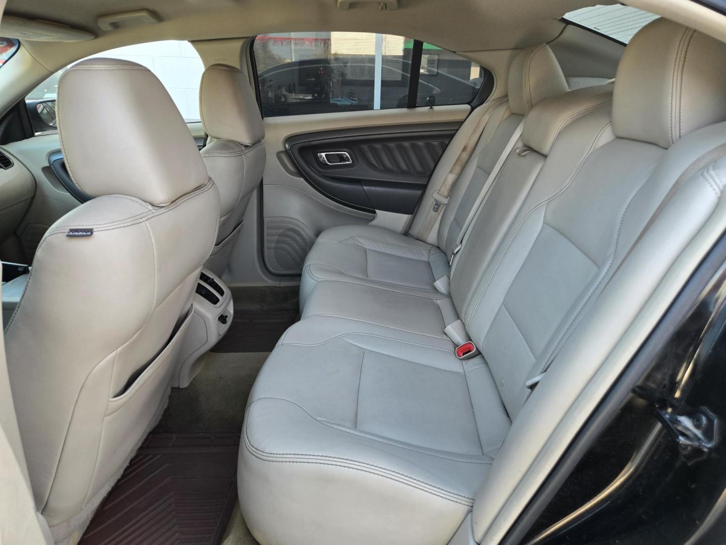 2011 Black Ford Taurus SEL FWD (1FAHP2EWXBG) with an 3.5L V6 DOHC 24V engine, 6-Speed Automatic transmission, located at 503 West Court, Seguin, TX, 78155, (830) 379-3373, 29.568621, -97.969803 - 2011 Ford Taurus SEL FWD with a 3.5L V6 DOHC 24V, Automatic, Tilt, Cruise, AM/FM/CD Stereo, Power Windows, Locks, Seat and Side Mirrors, Bluetooth, Leather Seating, Heated Seats, Tinted Windows, Dual Climate Control, Alloy Wheels, Rear Defroster and more!! - Photo#6