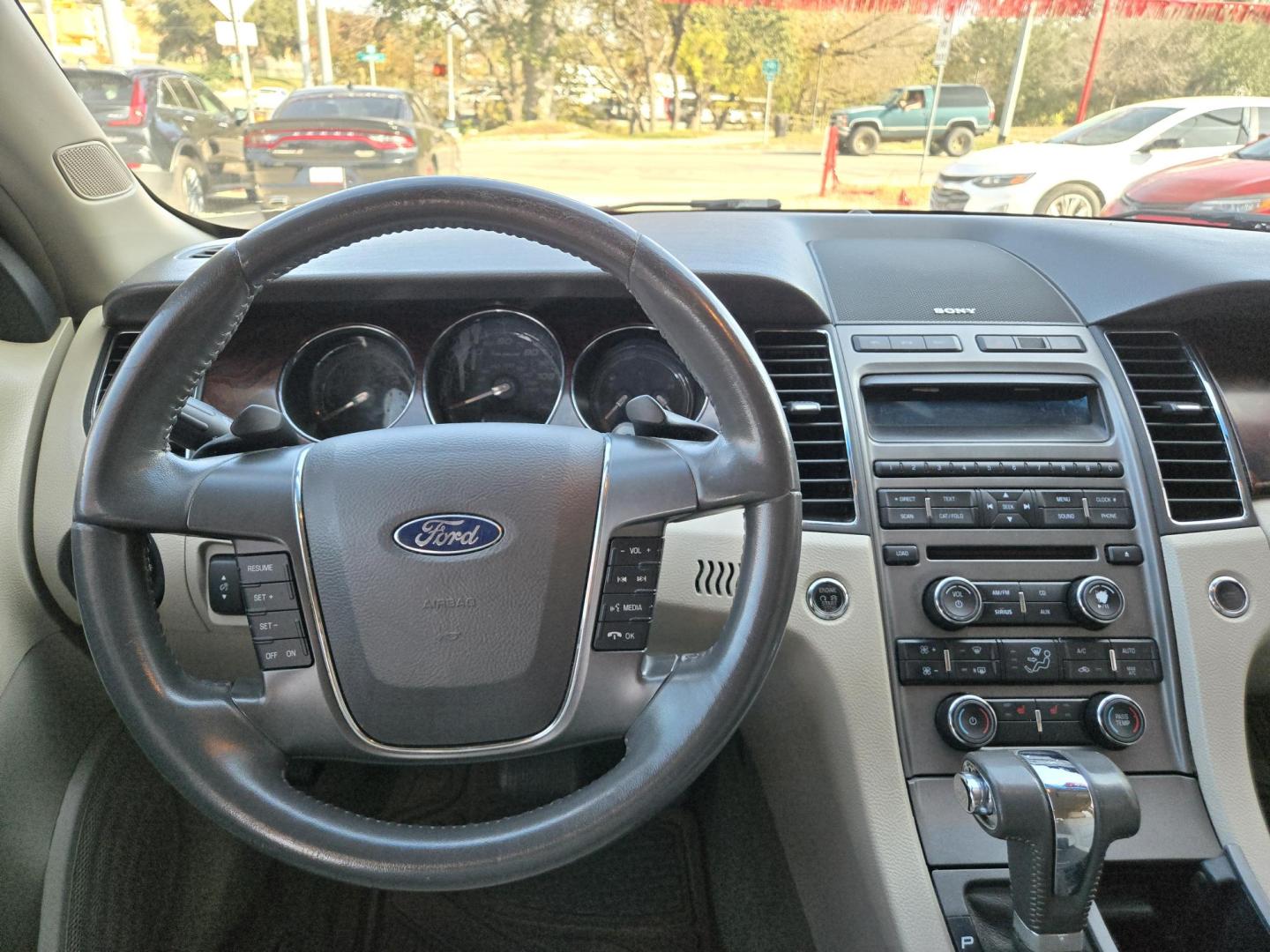 2011 Black Ford Taurus SEL FWD (1FAHP2EWXBG) with an 3.5L V6 DOHC 24V engine, 6-Speed Automatic transmission, located at 503 West Court, Seguin, TX, 78155, (830) 379-3373, 29.568621, -97.969803 - 2011 Ford Taurus SEL FWD with a 3.5L V6 DOHC 24V, Automatic, Tilt, Cruise, AM/FM/CD Stereo, Power Windows, Locks, Seat and Side Mirrors, Bluetooth, Leather Seating, Heated Seats, Tinted Windows, Dual Climate Control, Alloy Wheels, Rear Defroster and more!! - Photo#5
