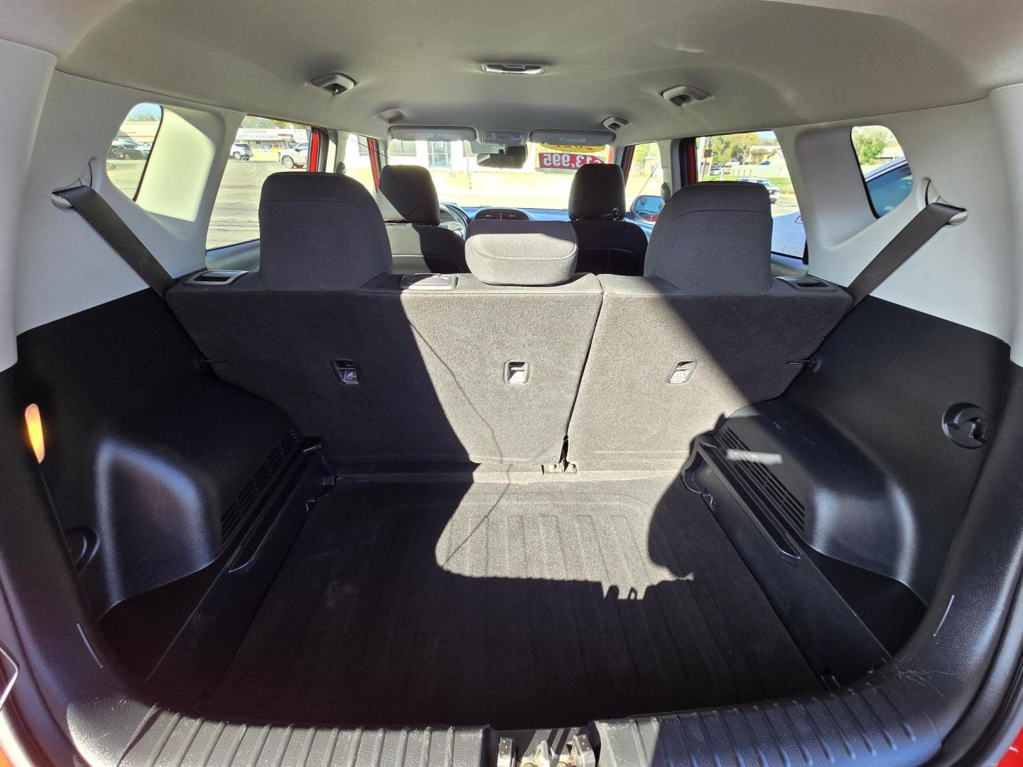 2021 Red Kia Soul LX CVT (KNDJ23AU2M7) with an 2.0L L4 DOHC 16V engine, Automatic transmission, located at 503 West Court, Seguin, TX, 78155, (830) 379-3373, 29.568621, -97.969803 - 2021 Kia Soul LX with a 2.0L L4 DOHC 16V, Automatic, Tilt, Cruise, AM/FM Touchscreen Stereo, Power Windows, Locks, Seat and Side Mirrors, Bluetooth, Backup Camera, Alloy Wheels, Rear Wiper, Rear Defroster and more!! *Merry Christmas inflatable not included, Get your own!* - Photo#7