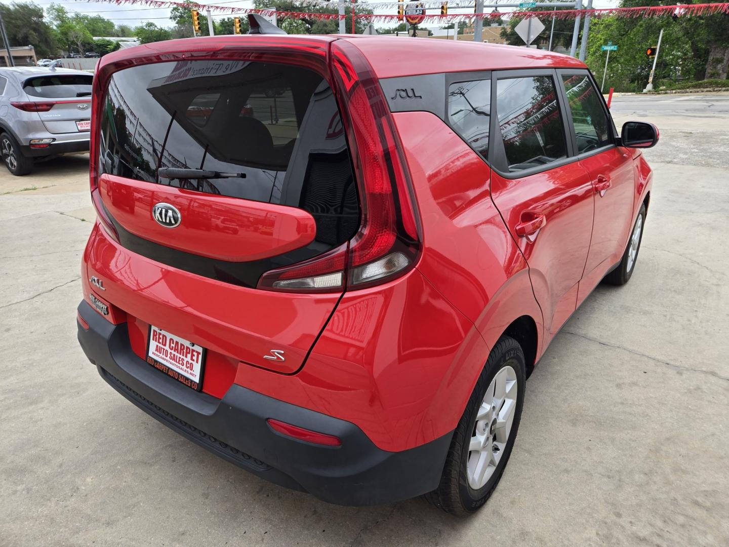 2021 Red Kia Soul LX CVT (KNDJ23AU2M7) with an 2.0L L4 DOHC 16V engine, Automatic transmission, located at 503 West Court, Seguin, TX, 78155, (830) 379-3373, 29.568621, -97.969803 - 2021 Kia Soul LX with a 2.0L L4 DOHC 16V, Automatic, Tilt, Cruise, AM/FM Touchscreen Stereo, Power Windows, Locks, Seat and Side Mirrors, Bluetooth, Backup Camera, Alloy Wheels, Rear Wiper, Rear Defroster and more!! *Merry Christmas inflatable not included, Get your own!* - Photo#2