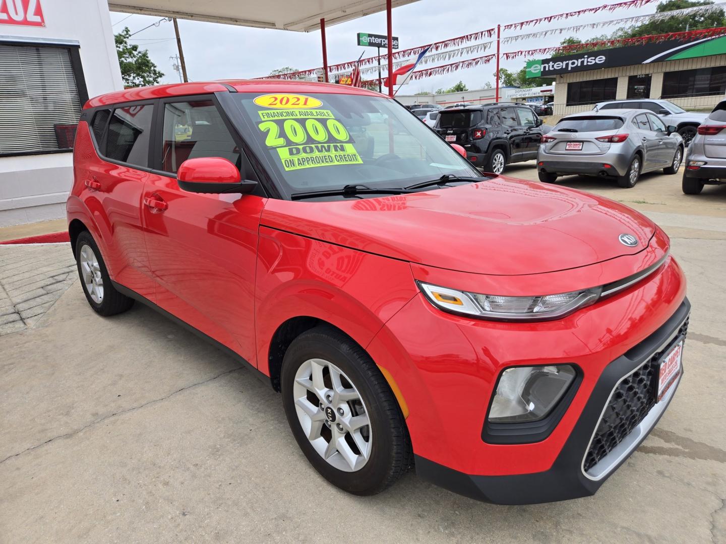 2021 Red Kia Soul LX CVT (KNDJ23AU2M7) with an 2.0L L4 DOHC 16V engine, Automatic transmission, located at 503 West Court, Seguin, TX, 78155, (830) 379-3373, 29.568621, -97.969803 - 2021 Kia Soul LX with a 2.0L L4 DOHC 16V, Automatic, Tilt, Cruise, AM/FM Touchscreen Stereo, Power Windows, Locks, Seat and Side Mirrors, Bluetooth, Backup Camera, Alloy Wheels, Rear Wiper, Rear Defroster and more!! *Merry Christmas inflatable not included, Get your own!* - Photo#1