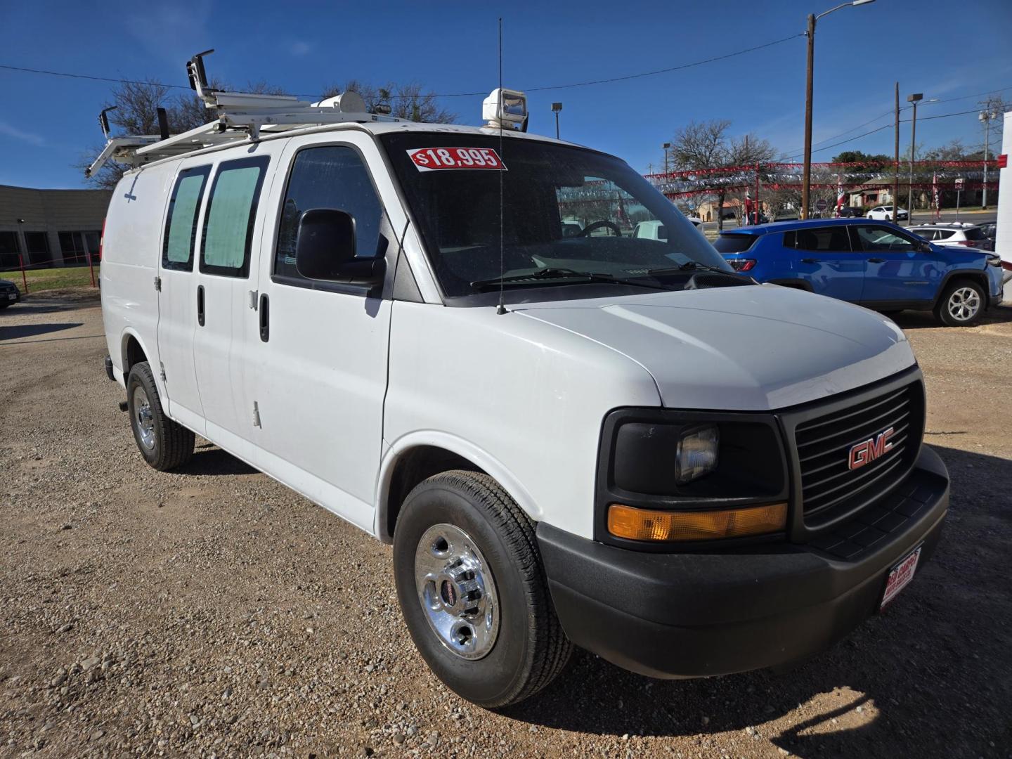 2015 WHITE GMC Savana G2500 Cargo (1GTW7FCB3F1) with an 6.0L V8 OHV 16V FFV engine, 6A transmission, located at 503 West Court, Seguin, TX, 78155, (830) 379-3373, 29.568621, -97.969803 - 2015 GMC SAVANA 2500 with a 6.0L V8 OHV 16V FFV, Automatic, Tilt, AM/FM/AUX Stereo, Power Windows, Automatic Headlights, Cage Divider, Rear Shelving, Backup Camera, Ladder Rack and more!! - Photo#1