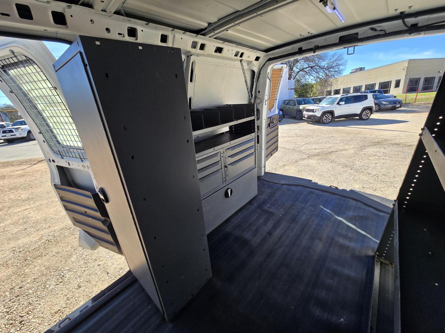 2015 WHITE GMC Savana G2500 Cargo (1GTW7FCB3F1) with an 6.0L V8 OHV 16V FFV engine, 6A transmission, located at 503 West Court, Seguin, TX, 78155, (830) 379-3373, 29.568621, -97.969803 - 2015 GMC SAVANA 2500 with a 6.0L V8 OHV 16V FFV, Automatic, Tilt, AM/FM/AUX Stereo, Power Windows, Automatic Headlights, Cage Divider, Rear Shelving, Backup Camera, Ladder Rack and more!! - Photo#9