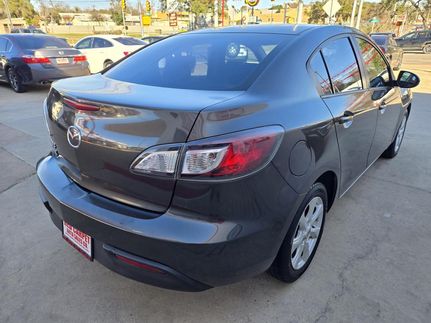 2010 GRAY Mazda MAZDA3 Unknown (JM1BL1SF1A1) with an 2.0L I4 F DOHC 16V engine, Automatic transmission, located at 503 West Court, Seguin, TX, 78155, (830) 379-3373, 29.568621, -97.969803 - 2010 Mazda MAZDA3 with a 2.0L I4 F DOHC 16V, Automatic, Tilt, Cruise, AM/FM/CD Stereo, Power Windows, Locks, and Side Mirrors, Bluetooth, Tinted Windows, Alloy Wheels, Rear Defroster and more!! - Photo#2
