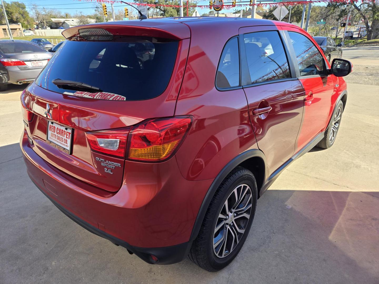 2016 Red Mitsubishi Outlander Sport 2.4 ES CVT (JA4AP3AWXGZ) with an 2.4L L4 DOHC 16V engine, Automatic transmission, located at 503 West Court, Seguin, TX, 78155, (830) 379-3373, 29.568621, -97.969803 - 2016 Mitsubishi Outlander Sport with a 2.4L L4 DOHC 16V, Automatic, Tilt, Cruise, AM/FM/CD Stereo, Power Windows, Locks and Side Mirrors, Bluetooth, Tinted Windows, Alloy Wheels, Rear Wiper, Rear Defroster and more!! - Photo#2