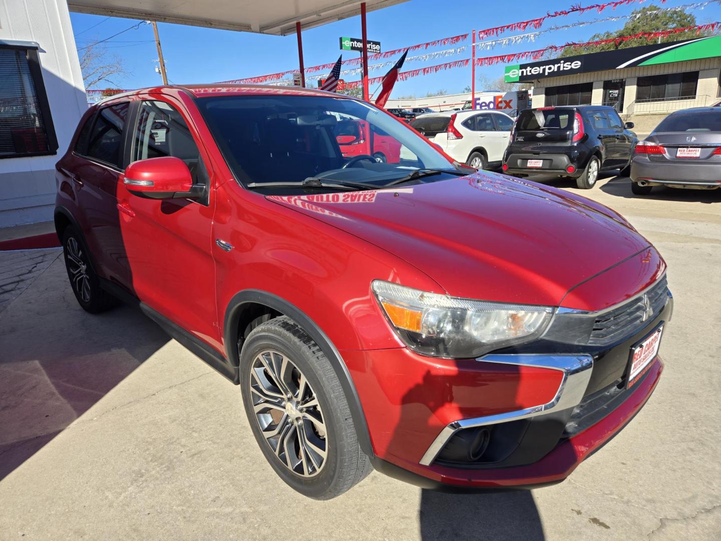2016 Red Mitsubishi Outlander Sport 2.4 ES CVT (JA4AP3AWXGZ) with an 2.4L L4 DOHC 16V engine, Automatic transmission, located at 503 West Court, Seguin, TX, 78155, (830) 379-3373, 29.568621, -97.969803 - 2016 Mitsubishi Outlander Sport with a 2.4L L4 DOHC 16V, Automatic, Tilt, Cruise, AM/FM/CD Stereo, Power Windows, Locks and Side Mirrors, Bluetooth, Tinted Windows, Alloy Wheels, Rear Wiper, Rear Defroster and more!! - Photo#1