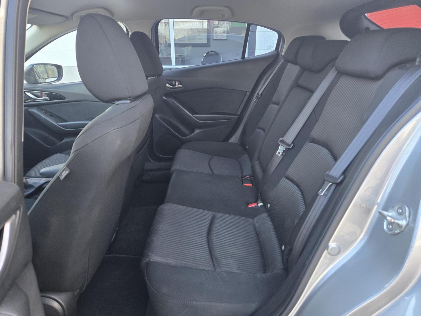 2015 SILVER Mazda MAZDA3 i Touring AT 5-Door (JM1BM1L76F1) with an 2.0L L4 DOHC 16V engine, 6-Speed Automatic transmission, located at 503 West Court, Seguin, TX, 78155, (830) 379-3373, 29.568621, -97.969803 - 2015 Mazda MAZDA3 i Touring with a 2.0L L4 DOHC 16V, Automatic, Tilt, Cruise, AM/FM Stereo, Power Windows, Locks and Side Mirrors, Bluetooth, Tinted Windows, Alloy Wheels, Backup Camera, Rear Wiper, Rear Defroster and more!! - Photo#6