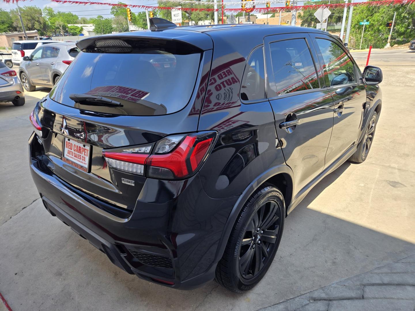 2021 Black Mitsubishi Outlander Sport 2.0 ES CVT (JA4APUAU1MU) with an 2.0L L4 DOHC 16V engine, Automatic transmission, located at 503 West Court, Seguin, TX, 78155, (830) 379-3373, 29.568621, -97.969803 - 2021 Mitsubishi Outlander Sport ES with a 2.0L L4 DOHC 16V, Automatic, Tilt, Cruise, AM/FM Stereo, Power Windows, Locks and Side Mirrors, Tinted Windows, Alloy Wheels, Backup Camera, Rear Wiper, Rear Defroster and more!! - Photo#2