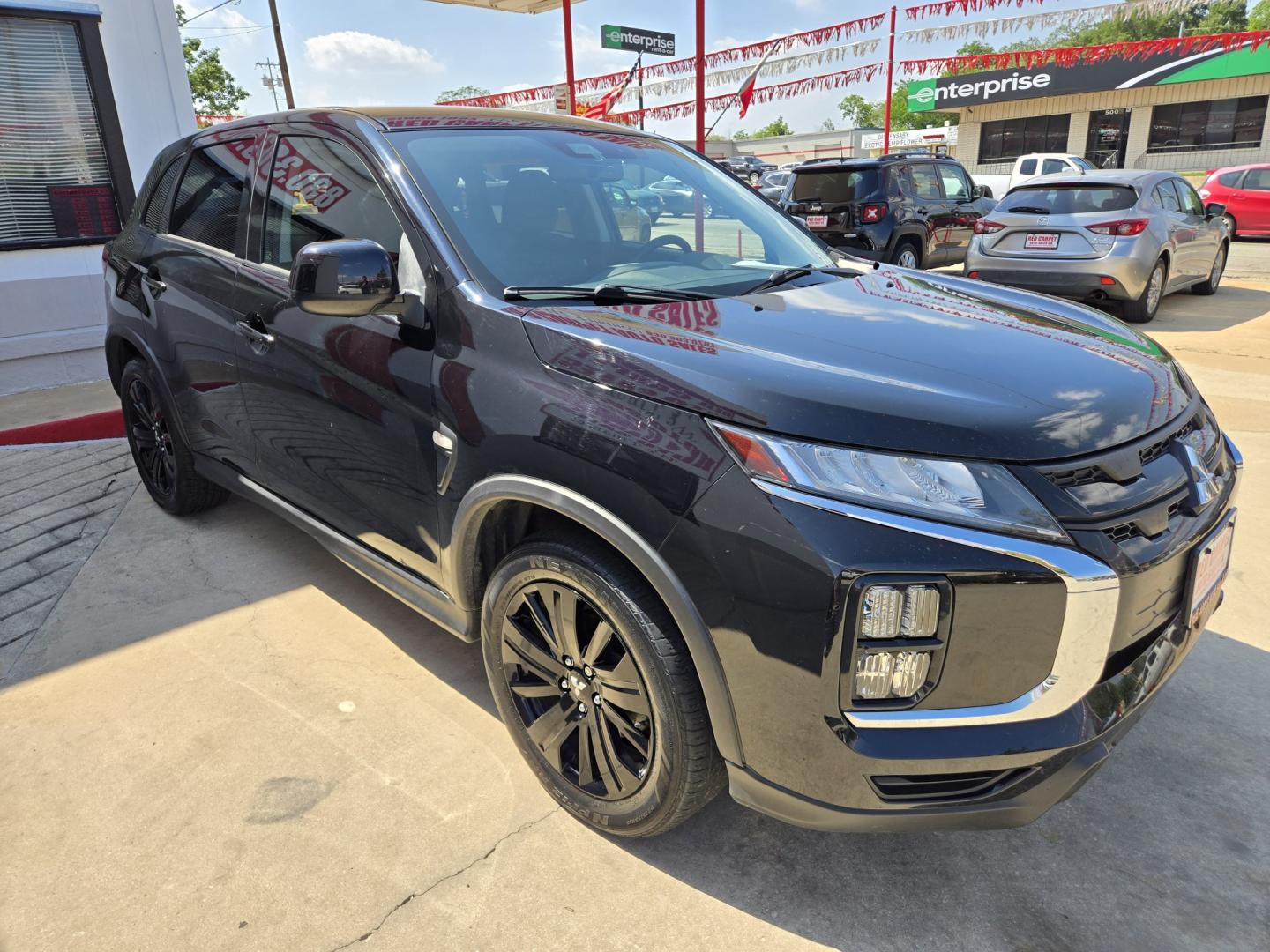 2021 Black Mitsubishi Outlander Sport 2.0 ES CVT (JA4APUAU1MU) with an 2.0L L4 DOHC 16V engine, Automatic transmission, located at 503 West Court, Seguin, TX, 78155, (830) 379-3373, 29.568621, -97.969803 - 2021 Mitsubishi Outlander Sport ES with a 2.0L L4 DOHC 16V, Automatic, Tilt, Cruise, AM/FM Stereo, Power Windows, Locks and Side Mirrors, Tinted Windows, Alloy Wheels, Backup Camera, Rear Wiper, Rear Defroster and more!! - Photo#1