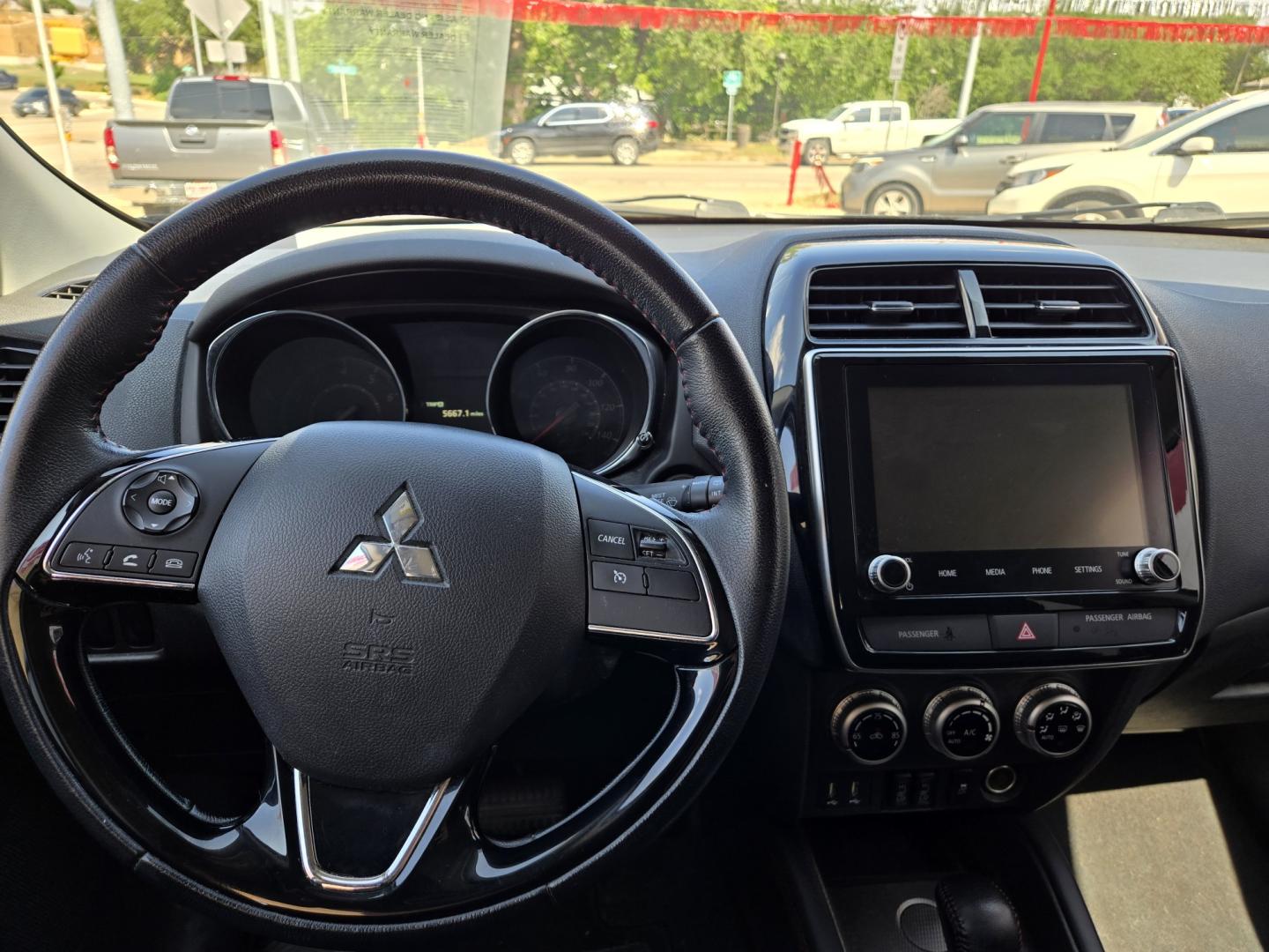 2021 Black Mitsubishi Outlander Sport 2.0 ES CVT (JA4APUAU1MU) with an 2.0L L4 DOHC 16V engine, Automatic transmission, located at 503 West Court, Seguin, TX, 78155, (830) 379-3373, 29.568621, -97.969803 - 2021 Mitsubishi Outlander Sport ES with a 2.0L L4 DOHC 16V, Automatic, Tilt, Cruise, AM/FM Stereo, Power Windows, Locks and Side Mirrors, Tinted Windows, Alloy Wheels, Backup Camera, Rear Wiper, Rear Defroster and more!! - Photo#5