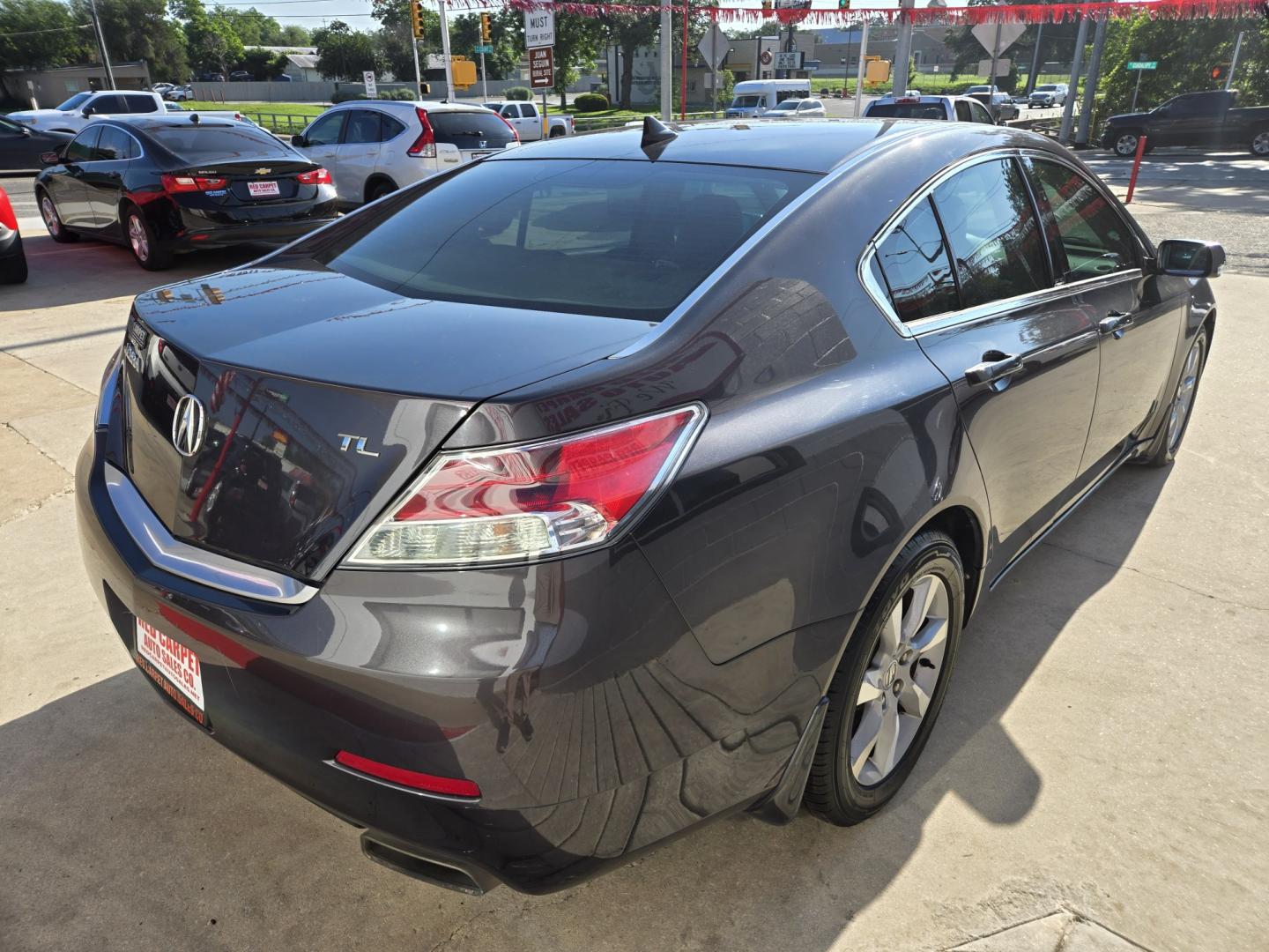 2012 Black Acura TL 6-Speed AT (19UUA8F23CA) with an 3.5L V6 SOHC 24V engine, 6-Speed Automatic transmission, located at 503 West Court, Seguin, TX, 78155, (830) 379-3373, 29.568621, -97.969803 - 2012 Acura TL with a 3.5L V6 SOHC 24V, Automatic, Tilt, Cruise, AM/FM/CD Stereo, Power Windows, Locks, Seat and Side Mirrors, Leather Seating, Bluetooth, Power Sunroof, Dual Climate Control, Rear A/C, Alloy Wheels, Tinted Windows, Rear Defroster and more!! - Photo#2
