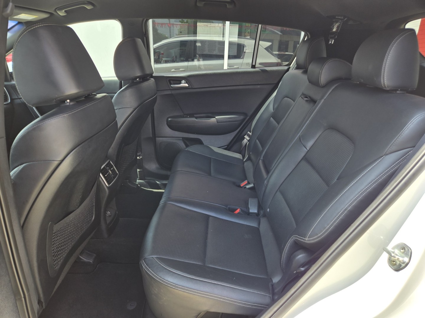 2020 WHITE Kia Sportage S FWD (KNDP63AC0L7) with an 2.4L V6 DOHC 24V engine, 6A transmission, located at 503 West Court, Seguin, TX, 78155, (830) 379-3373, 29.568621, -97.969803 - 2020 Kia Sportage S FWD with a 2.4L V6 DOHC 24V, Automatic, Tilt, Cruise, AM/FM Touchscreen Stereo, Power Windows, Locks and Side Mirrors, Bluetooth, Leather Seating, Rear A/C, Tinted Windows, Backup Camera, Rear Wiper, Rear Defroster and more!! - Photo#6