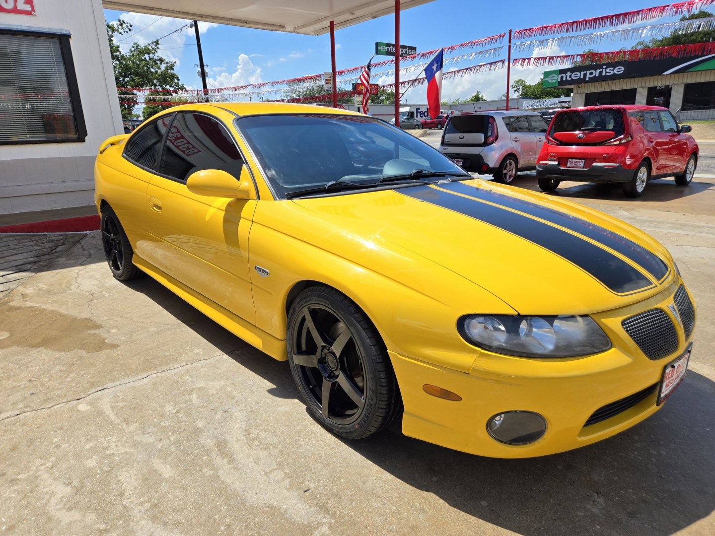 2004 YELLOW Pontiac GTO Coupe (6G2VX12GX4L) with an 5.7L V8 OHV 16V engine, Manual Transmission transmission, located at 503 West Court, Seguin, TX, 78155, (830) 379-3373, 29.568621, -97.969803 - 2004 Pontiac GTO Coupe with a 5.7L V8 OHV 16V, Standard Transmission, Tilt, AM/FM/6 Disc CD Stereo System, Power Windows, Locks and Seat, Leather Seating, Automatic Headlights, Rear Defroster and more!! - Photo#1