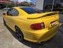 2004 YELLOW Pontiac GTO Coupe (6G2VX12GX4L) with an 5.7L V8 OHV 16V engine, Manual Transmission transmission, located at 503 West Court, Seguin, TX, 78155, (830) 379-3373, 29.568621, -97.969803 - 2004 Pontiac GTO Coupe with a 5.7L V8 OHV 16V, Standard Transmission, Tilt, AM/FM/6 Disc CD Stereo System, Power Windows, Locks and Seat, Leather Seating, Automatic Headlights, Rear Defroster and more!! - Photo#3