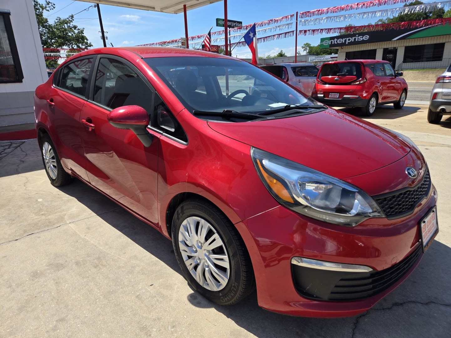 2017 Red Kia Rio LX 6A (KNADM4A30H6) with an 1.6L L4 DOHC 16V engine, 6A transmission, located at 503 West Court, Seguin, TX, 78155, (830) 379-3373, 29.568621, -97.969803 - 2017 Kia Rio LX with a 1.6L L4 DOHC 16V, Standard Transmission, Tilt, AM/FM/6 Disc CD Stereo, Power Windows, Locks and Seat, Leather Seating, Automatic Headlights, Rear Defroster and more!! - Photo#1