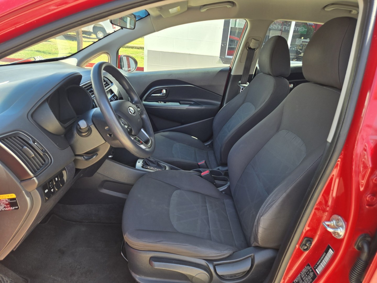 2017 Red Kia Rio LX 6A (KNADM4A30H6) with an 1.6L L4 DOHC 16V engine, 6A transmission, located at 503 West Court, Seguin, TX, 78155, (830) 379-3373, 29.568621, -97.969803 - 2017 Kia Rio LX with a 1.6L L4 DOHC 16V, Standard Transmission, Tilt, AM/FM/6 Disc CD Stereo, Power Windows, Locks and Seat, Leather Seating, Automatic Headlights, Rear Defroster and more!! - Photo#4