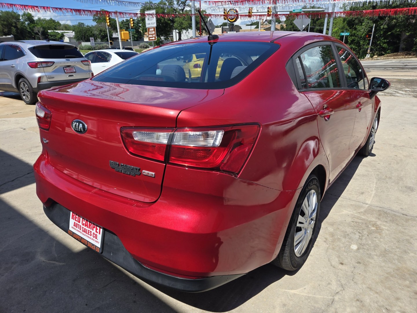 2017 Red Kia Rio LX 6A (KNADM4A30H6) with an 1.6L L4 DOHC 16V engine, 6A transmission, located at 503 West Court, Seguin, TX, 78155, (830) 379-3373, 29.568621, -97.969803 - 2017 Kia Rio LX with a 1.6L L4 DOHC 16V, Standard Transmission, Tilt, AM/FM/6 Disc CD Stereo, Power Windows, Locks and Seat, Leather Seating, Automatic Headlights, Rear Defroster and more!! - Photo#2