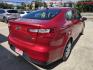 2017 Red Kia Rio LX 6A (KNADM4A30H6) with an 1.6L L4 DOHC 16V engine, 6A transmission, located at 503 West Court, Seguin, TX, 78155, (830) 379-3373, 29.568621, -97.969803 - 2017 Kia Rio LX with a 1.6L L4 DOHC 16V, Standard Transmission, Tilt, AM/FM/6 Disc CD Stereo, Power Windows, Locks and Seat, Leather Seating, Automatic Headlights, Rear Defroster and more!! - Photo#2