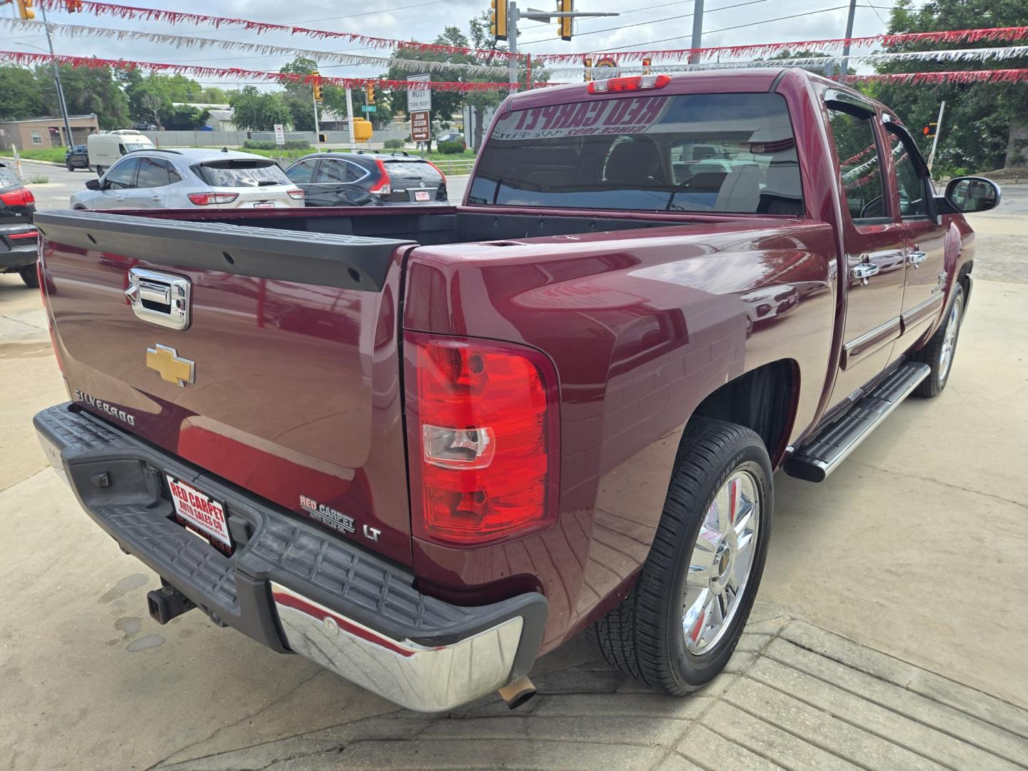 2013 Red Chevrolet Silverado 1500 LT Crew Cab 2WD (3GCPCSE06DG) with an 5.3L V8 OHV 16V FFV engine, 6-Speed Automatic transmission, located at 503 West Court, Seguin, TX, 78155, (830) 379-3373, 29.568621, -97.969803 - 2013 Chevrolet Silverado 1500 LT Crew Cab 2WD with a 5.3L V8 OHV 16V FFV, Automatic, Tilt, Cruise, AM/FM/CD/AUX Stereo, Power Windows, Locks, Seat and Side Mirrors, Bluetooth, Front Bench Seating Leather Seating, Dual Climate Control, Onstar Capability, Running Boards, Trailer Towing, Tinted Windows- Photo#2