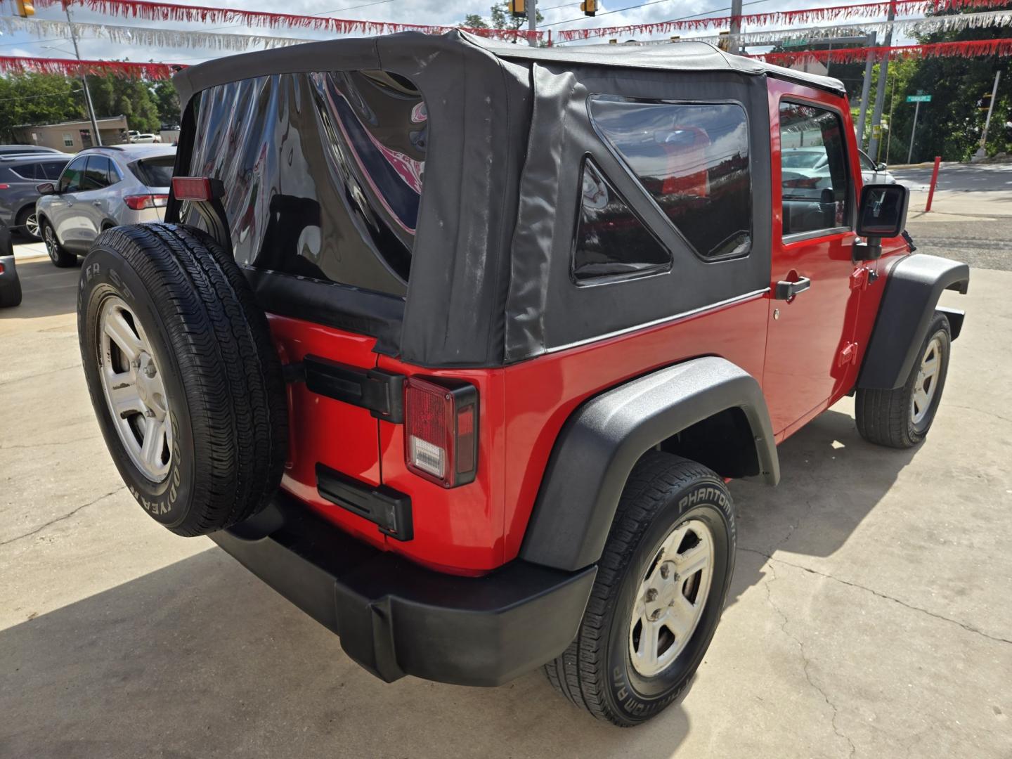 2007 RED Jeep Wrangler X (1J4FA24107L) with an 3.8L V6 OHV 12V engine, Automatic transmission, located at 503 West Court, Seguin, TX, 78155, (830) 379-3373, 29.568621, -97.969803- Photo#2