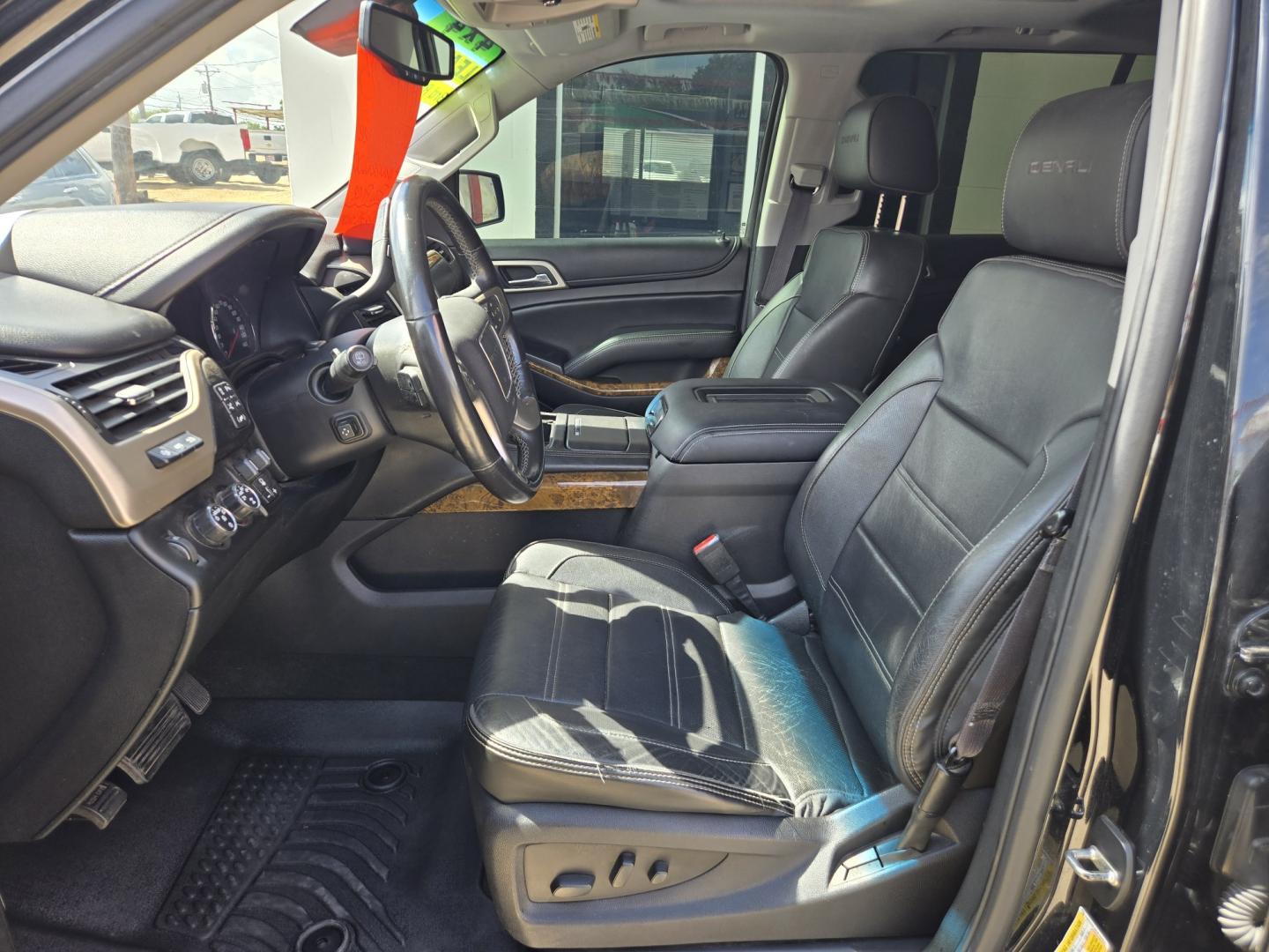 2016 Black GMC Yukon XL Denali 4WD (1GKS2HKJ6GR) with an 6.2L V8 OHV 16V engine, 6A transmission, located at 503 West Court, Seguin, TX, 78155, (830) 379-3373, 29.568621, -97.969803 - 2016 GMC Yukon XL Denali 4WD with a 6.2L V8 OHV 16V, Automatic, Tilt, Cruise, AM/FM Touchscreen Stereo, Power Windows, Locks, Seat and Side Mirrors, Leather Seating, Bluetooth, Dual Climate Control, Rear A/C, Third Row Seating, Power Rear Hatch, Power Running Boards, Power Sunroof, Alloy Wheels, Tin- Photo#4