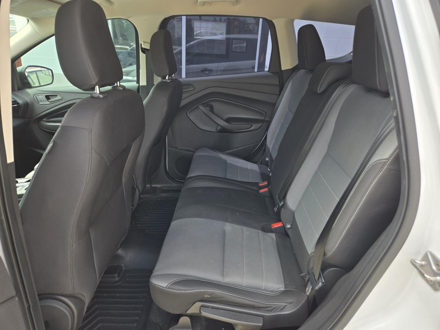 2019 WHITE Ford Escape S FWD (1FMCU0F70KU) with an 2.5L L4 DOHC 16V engine, 6A transmission, located at 503 West Court, Seguin, TX, 78155, (830) 379-3373, 29.568621, -97.969803 - 2019 Ford Escape S FWD with a 2.5L L4 DOHC 16V, Automatic, Tilt, Cruise, AM/FM Stereo, Power Windows, Locks and Side Mirrors, Bluetooth, Tinted Windows, Automatic Headlights, Rear Wiper, Rear Defroster and more!!- Photo#6