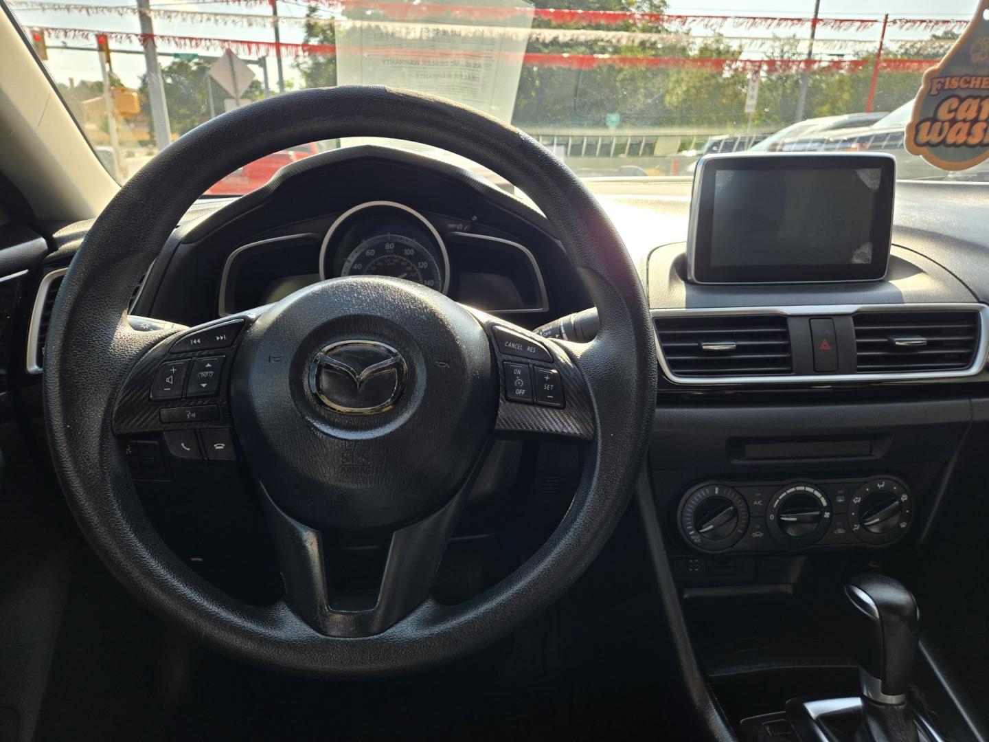 2015 Black Mazda MAZDA3 i Sport AT 4-Door (3MZBM1U7XFM) with an 2.0L L4 DOHC 16V engine, 6-Speed Automatic transmission, located at 503 West Court, Seguin, TX, 78155, (830) 379-3373, 29.568621, -97.969803 - 2015 Mazda MAZDA3 i Sport AT 4-Door with a 2.0L L4 DOHC 16V, Automatic, Tilt, Cruise, AM/FM/AUX Stereo, Power Windows, Locks and Side Mirrors, Bluetooth, Tinted Windows, Rear Defroster and more!!- Photo#5