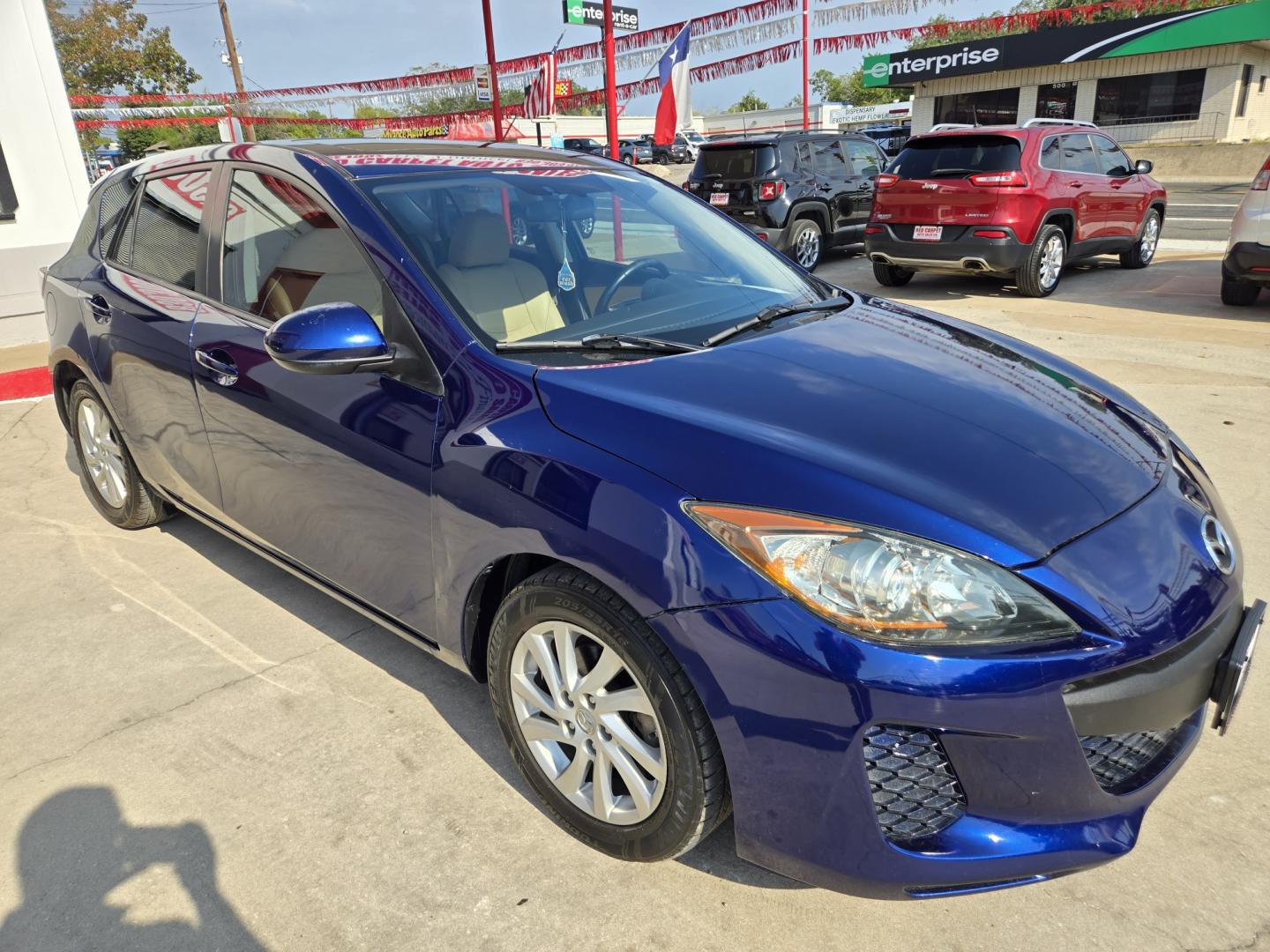 2012 BLUE Mazda MAZDA3 I Grand Touring 5-Door (JM1BL1M76C1) with an 2.0L L4 DOHC 16V engine, Automatic transmission, located at 503 West Court, Seguin, TX, 78155, (830) 379-3373, 29.568621, -97.969803 - 2012 Mazda MAZDA3 I Grand Touring 5-Door with a 2.0L L4 DOHC 16V, Automatic, Tilt, Cruise, AM/FM/CD Stereo, Power Windows, Locks, Seat and Side Mirrors, Bluetooth, Leather Seating, Heated Seats, Power Sunroof, Alloy Wheels, Rear Wiper, Rear Defroster and more!!- Photo#1