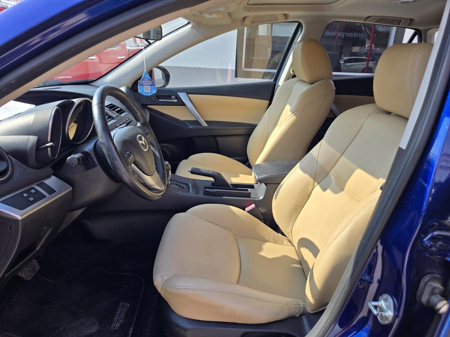2012 BLUE Mazda MAZDA3 I Grand Touring 5-Door (JM1BL1M76C1) with an 2.0L L4 DOHC 16V engine, Automatic transmission, located at 503 West Court, Seguin, TX, 78155, (830) 379-3373, 29.568621, -97.969803 - 2012 Mazda MAZDA3 I Grand Touring 5-Door with a 2.0L L4 DOHC 16V, Automatic, Tilt, Cruise, AM/FM/CD Stereo, Power Windows, Locks, Seat and Side Mirrors, Bluetooth, Leather Seating, Heated Seats, Power Sunroof, Alloy Wheels, Rear Wiper, Rear Defroster and more!!- Photo#4