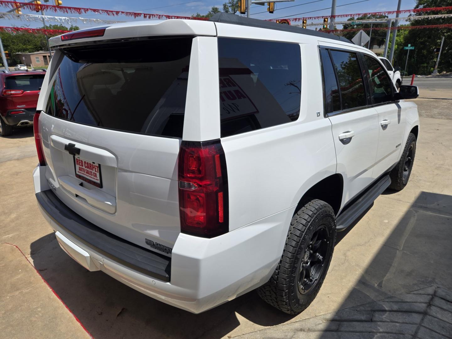 2019 WHITE Chevrolet Tahoe LT 2WD (1GNSCBKC6KR) with an 5.3L V8 OHV 16V engine, 6A transmission, located at 503 West Court, Seguin, TX, 78155, (830) 379-3373, 29.568621, -97.969803 - 2019 Chevrolet Tahoe LT 2WD with a 5.3L V8 OHV 16V, Automatic, Tilt, Cruise, AM/FM Touchscreen Stereo, Power Windows, Locks, Seat and Side Mirrors, Bluetooth, Leather Seating, Heated Seats, Third Row Seating, Dual Climate Control, Rear A/C, Tinted Windows, Trailer Towing, Backup Camera, Bumper Senso- Photo#2