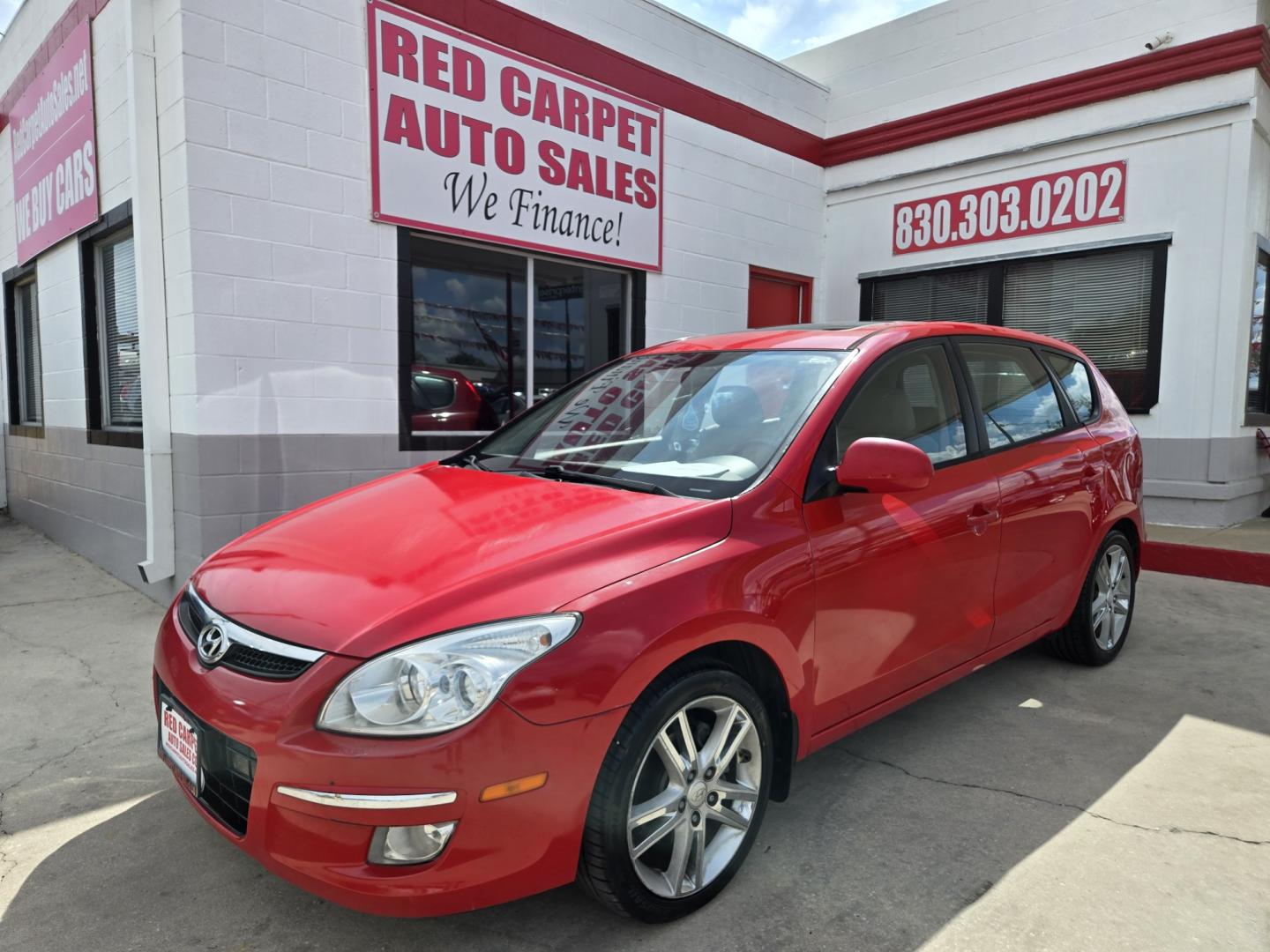 2009 RED Hyundai Elantra Automatic (KMHDC86E99U) with an 2.0L L4 DOHC 16V engine, 4A transmission, located at 503 West Court, Seguin, TX, 78155, (830) 379-3373, 29.568621, -97.969803- Photo#0
