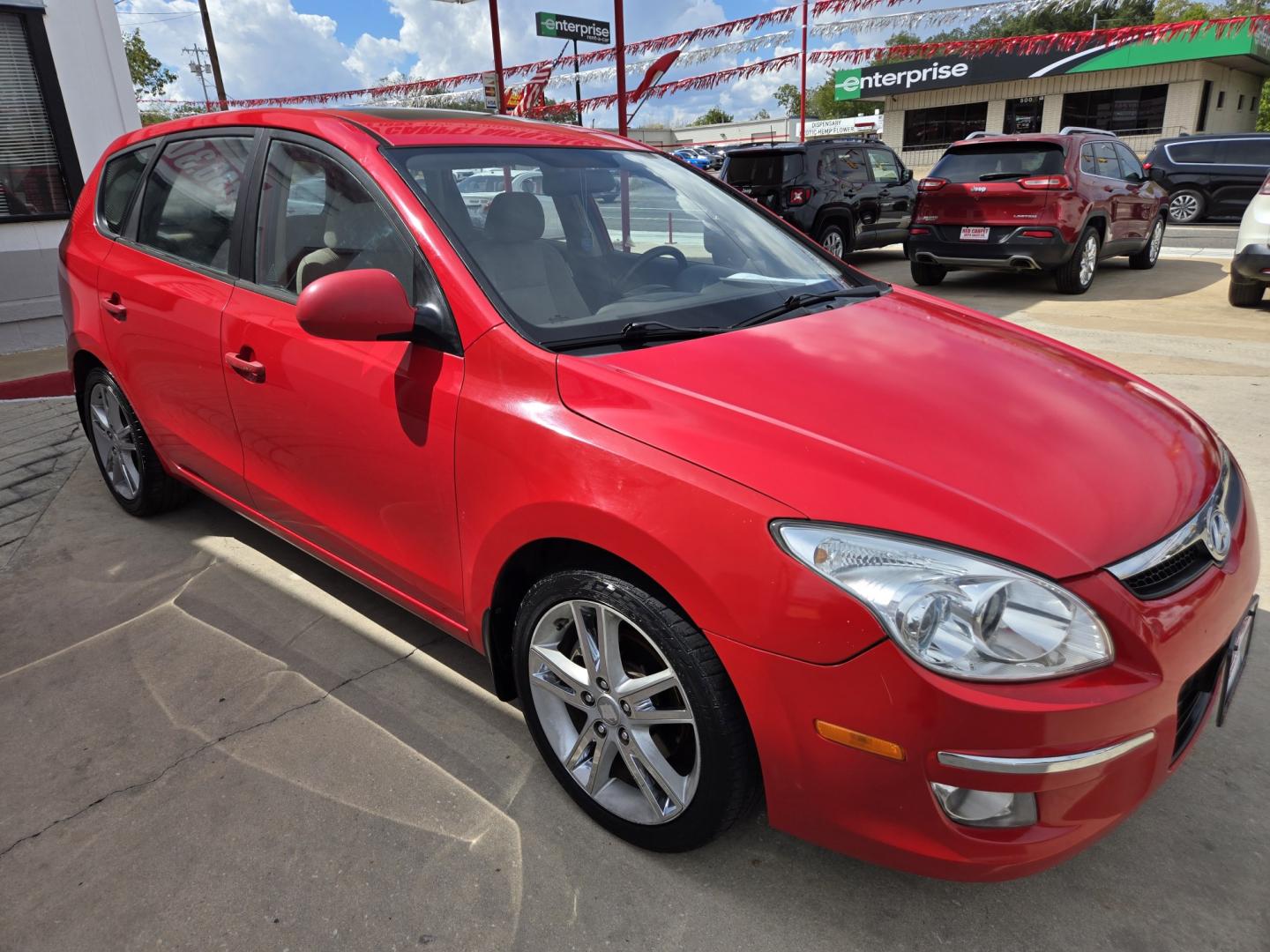 2009 RED Hyundai Elantra Automatic (KMHDC86E99U) with an 2.0L L4 DOHC 16V engine, 4A transmission, located at 503 West Court, Seguin, TX, 78155, (830) 379-3373, 29.568621, -97.969803- Photo#1