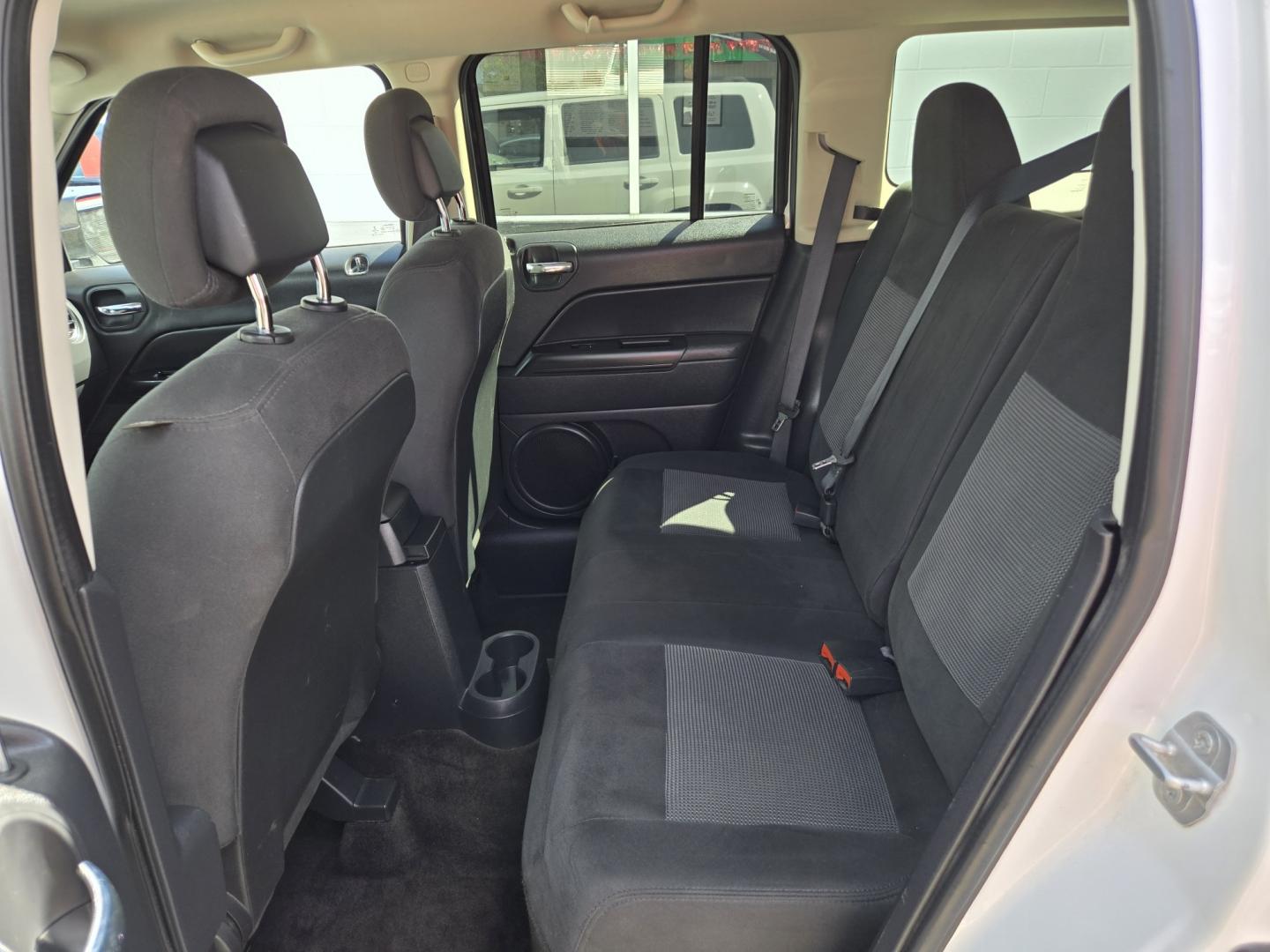 2015 WHITE Jeep Patriot Sport 2WD (1C4NJPBA7FD) with an 2.0L L4 DOHC 16V engine, Automatic transmission, located at 503 West Court, Seguin, TX, 78155, (830) 379-3373, 29.568621, -97.969803 - 2015 Jeep Patriot Sport 2WD with a 2.0L L4 DOHC 16V, Automatic, Tilt, Cruise, AM/FM/CD/AUX Stereo, Power Windows, Locks and Side Mirrors, Bluetooth, Tinted Windows, Alloy Wheels, Rear Wiper, Rear Defroster and more!!- Photo#6
