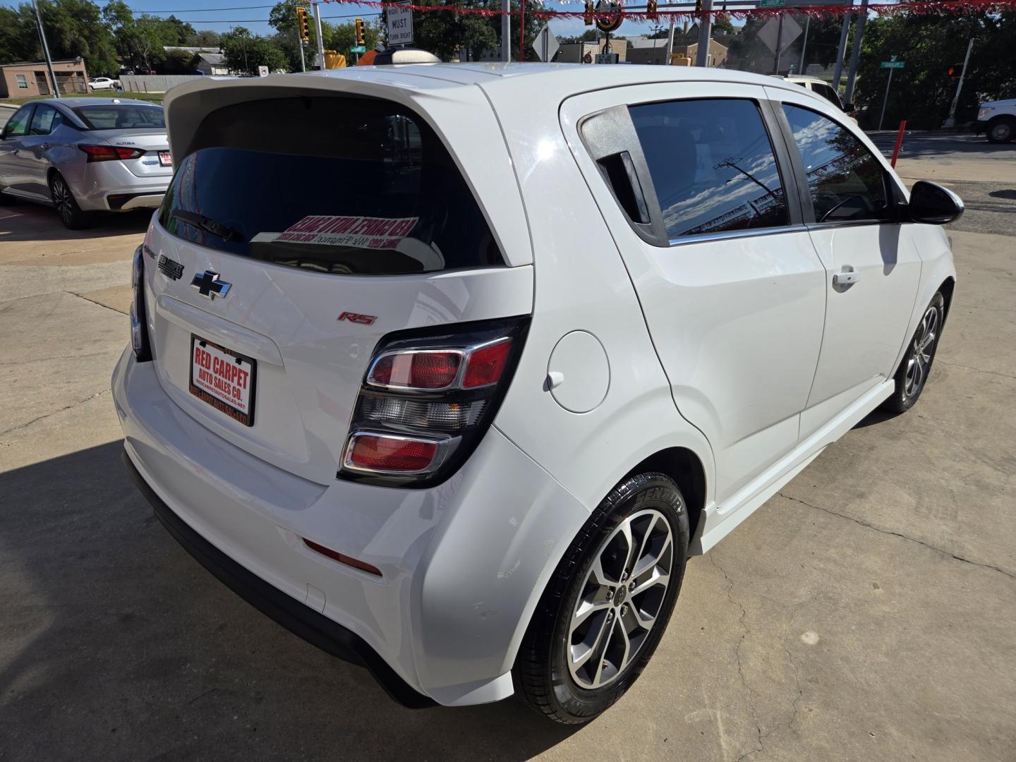 2019 WHITE Chevrolet Sonic LT Auto 5-Door (1G1JD6SB8K4) with an 1.4L L4 DOHC 24V TURBO engine, 6A transmission, located at 503 West Court, Seguin, TX, 78155, (830) 379-3373, 29.568621, -97.969803 - 2019 Chevrolet Sonic LT with a 1.4L L4 DOHC 24V TURBO, Automatic, Tilt, Cruise, AM/FM Touchscreen Stereo, Power Windows, Locks and Side Mirrors, Bluetooth, Onstar Capability, Heated Seats, Backup Camera, Alloy Wheels, Rear Wiper, Rear Defroster and more!!- Photo#2