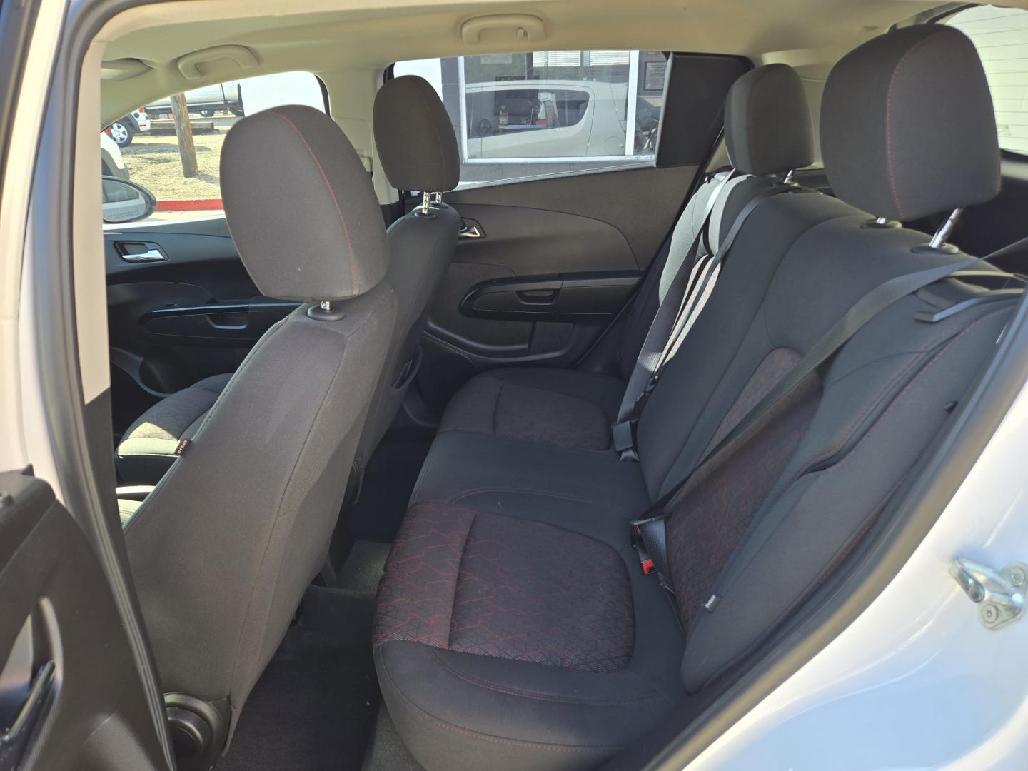 2019 WHITE Chevrolet Sonic LT Auto 5-Door (1G1JD6SB8K4) with an 1.4L L4 DOHC 24V TURBO engine, 6A transmission, located at 503 West Court, Seguin, TX, 78155, (830) 379-3373, 29.568621, -97.969803 - 2019 Chevrolet Sonic LT with a 1.4L L4 DOHC 24V TURBO, Automatic, Tilt, Cruise, AM/FM Touchscreen Stereo, Power Windows, Locks and Side Mirrors, Bluetooth, Onstar Capability, Heated Seats, Backup Camera, Alloy Wheels, Rear Wiper, Rear Defroster and more!!- Photo#6