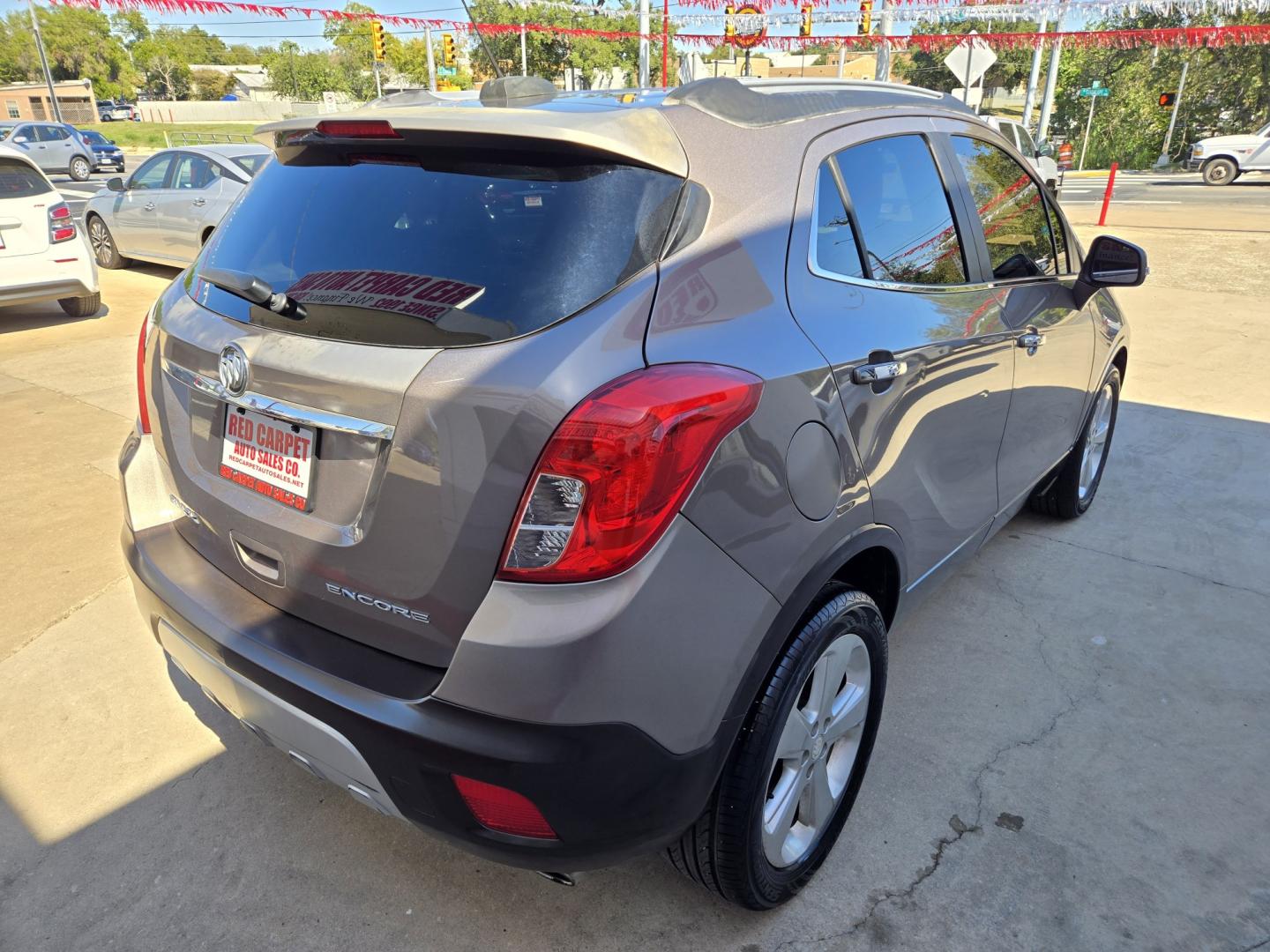 2015 Pewter Buick Encore Base FWD (KL4CJASB4FB) with an 1.4L L4 DOHC 16V TURBO engine, 6A transmission, located at 503 West Court, Seguin, TX, 78155, (830) 379-3373, 29.568621, -97.969803- Photo#2