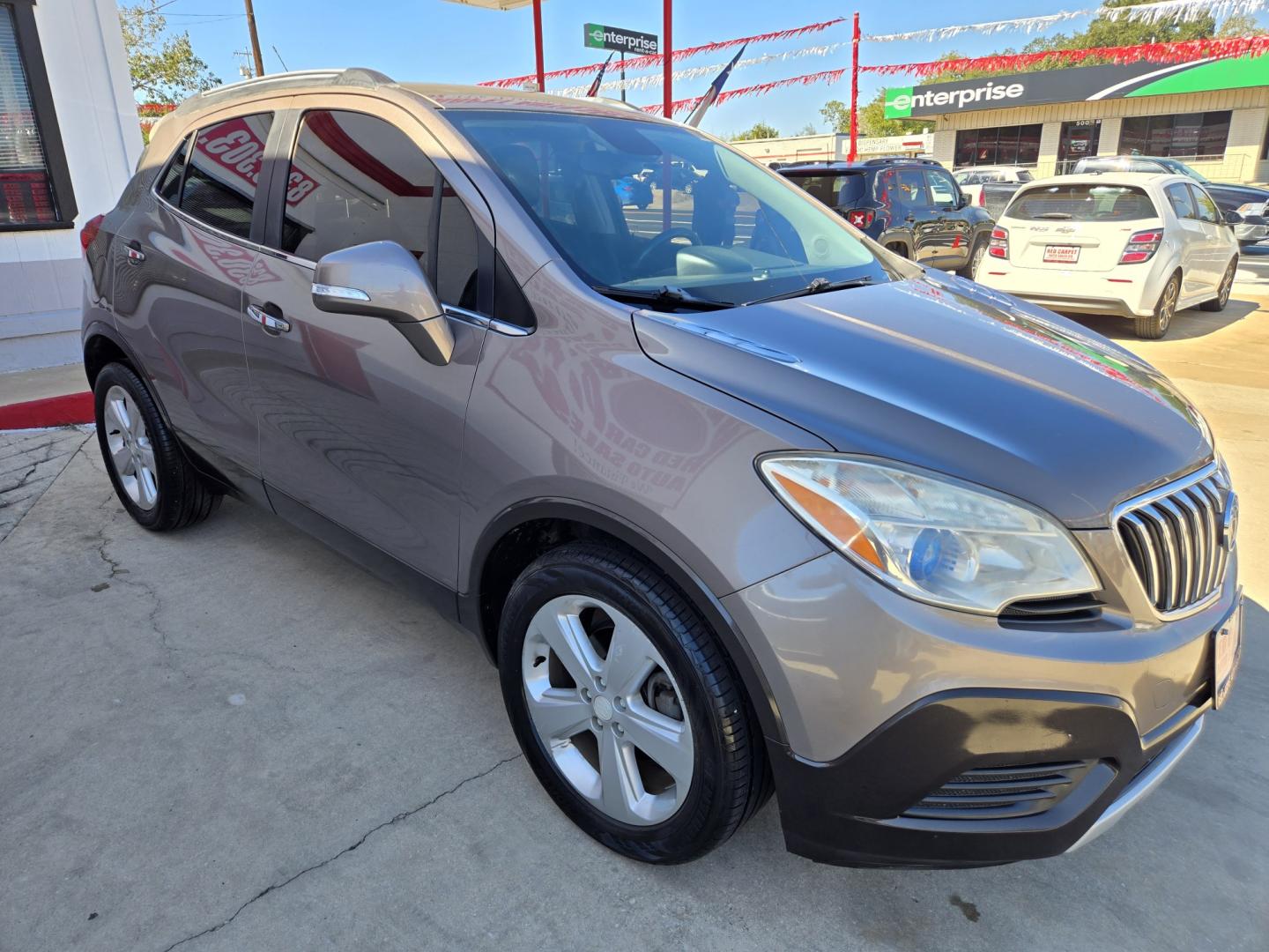 2015 Pewter Buick Encore Base FWD (KL4CJASB4FB) with an 1.4L L4 DOHC 16V TURBO engine, 6A transmission, located at 503 West Court, Seguin, TX, 78155, (830) 379-3373, 29.568621, -97.969803- Photo#1
