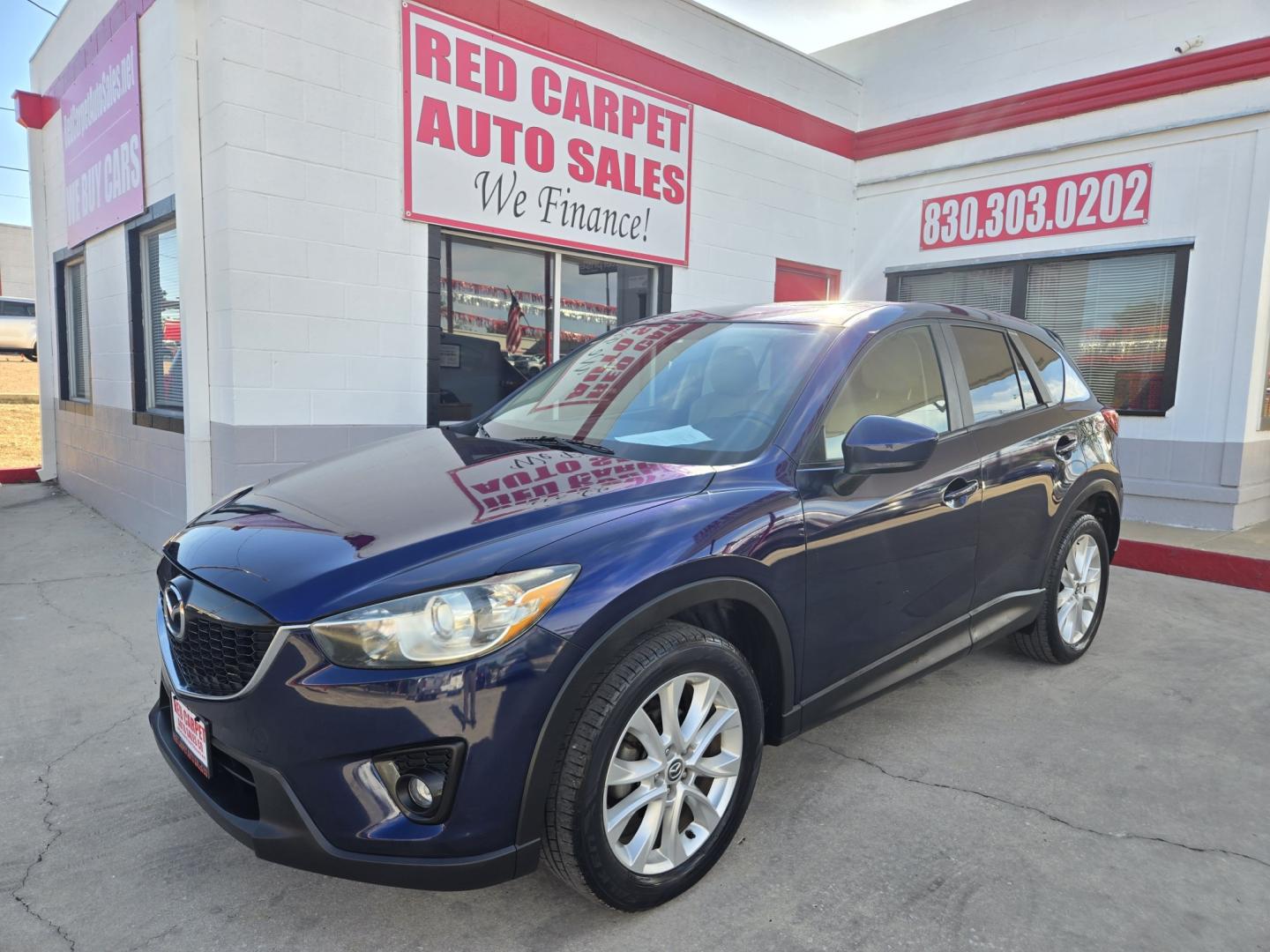 2013 BLUE Mazda CX-5 Grand Touring (JM3KE2DE8D0) with an 2.0L l4 F DOHC 16V engine, 6A transmission, located at 503 West Court, Seguin, TX, 78155, (830) 379-3373, 29.568621, -97.969803 - 2013 Mazda CX-5 Grand Touring with a 2.0L l4 F DOHC 16V, Automatic, Tilt, Cruise, AM/FM/CD Touchscreen Stereo, Power Windows, Locks, Seats and Side Mirrors, Leather Seating, Bluetooth, Dual Climate Control, Power Sunroof, Tinted Windows, Alloy Wheels, Rear Wiper, Rear Defroster and more!!- Photo#0
