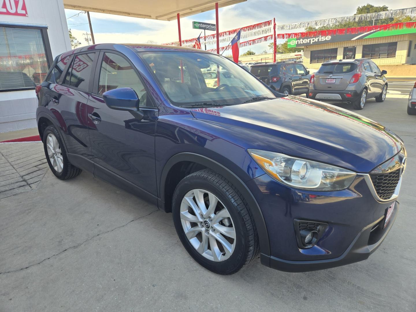 2013 BLUE Mazda CX-5 Grand Touring (JM3KE2DE8D0) with an 2.0L l4 F DOHC 16V engine, 6A transmission, located at 503 West Court, Seguin, TX, 78155, (830) 379-3373, 29.568621, -97.969803 - 2013 Mazda CX-5 Grand Touring with a 2.0L l4 F DOHC 16V, Automatic, Tilt, Cruise, AM/FM/CD Touchscreen Stereo, Power Windows, Locks, Seats and Side Mirrors, Leather Seating, Bluetooth, Dual Climate Control, Power Sunroof, Tinted Windows, Alloy Wheels, Rear Wiper, Rear Defroster and more!!- Photo#1